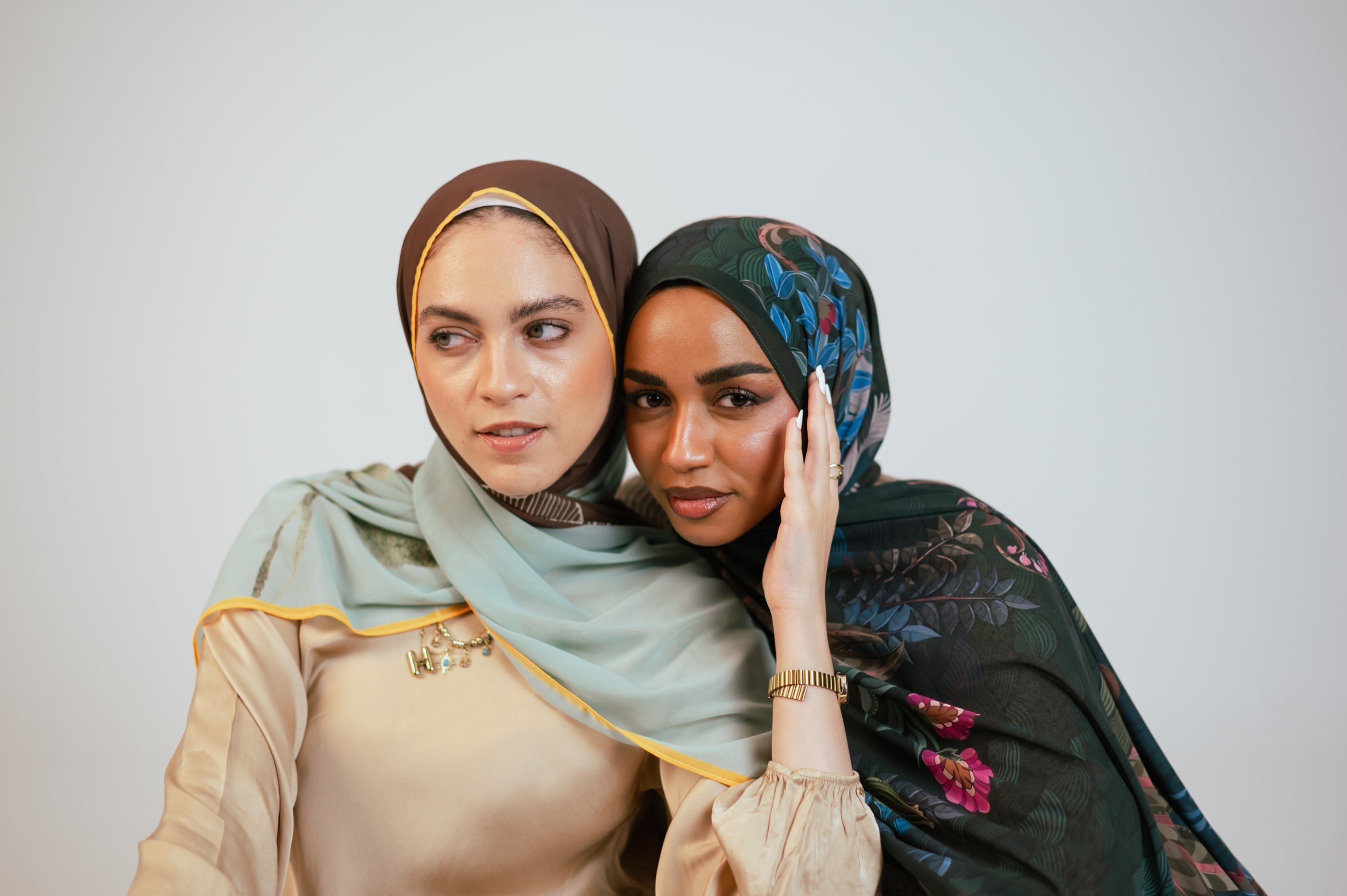 Two models wearing Terra Soliel and Secret Garden Hijabs