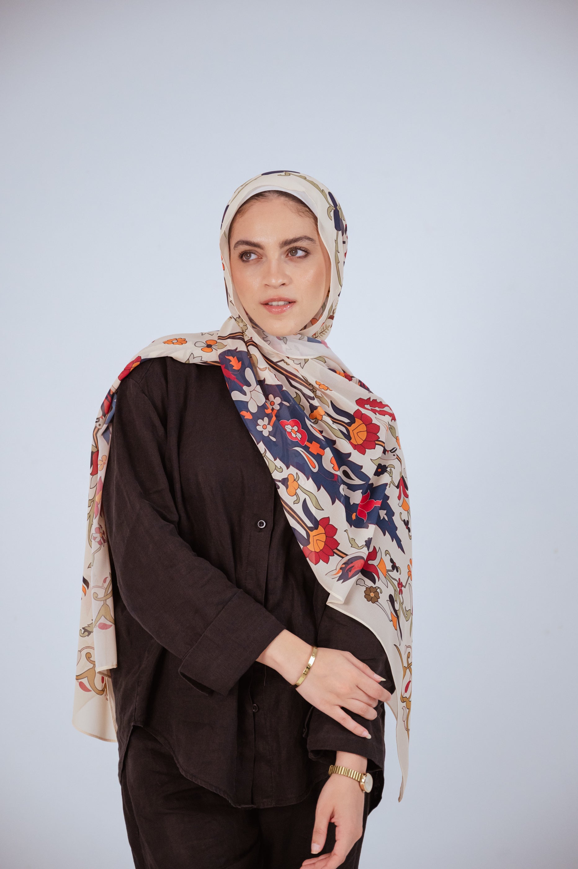 Model wearing the Andalus Drape luxury chiffon hijab in cream floral print – frontal view