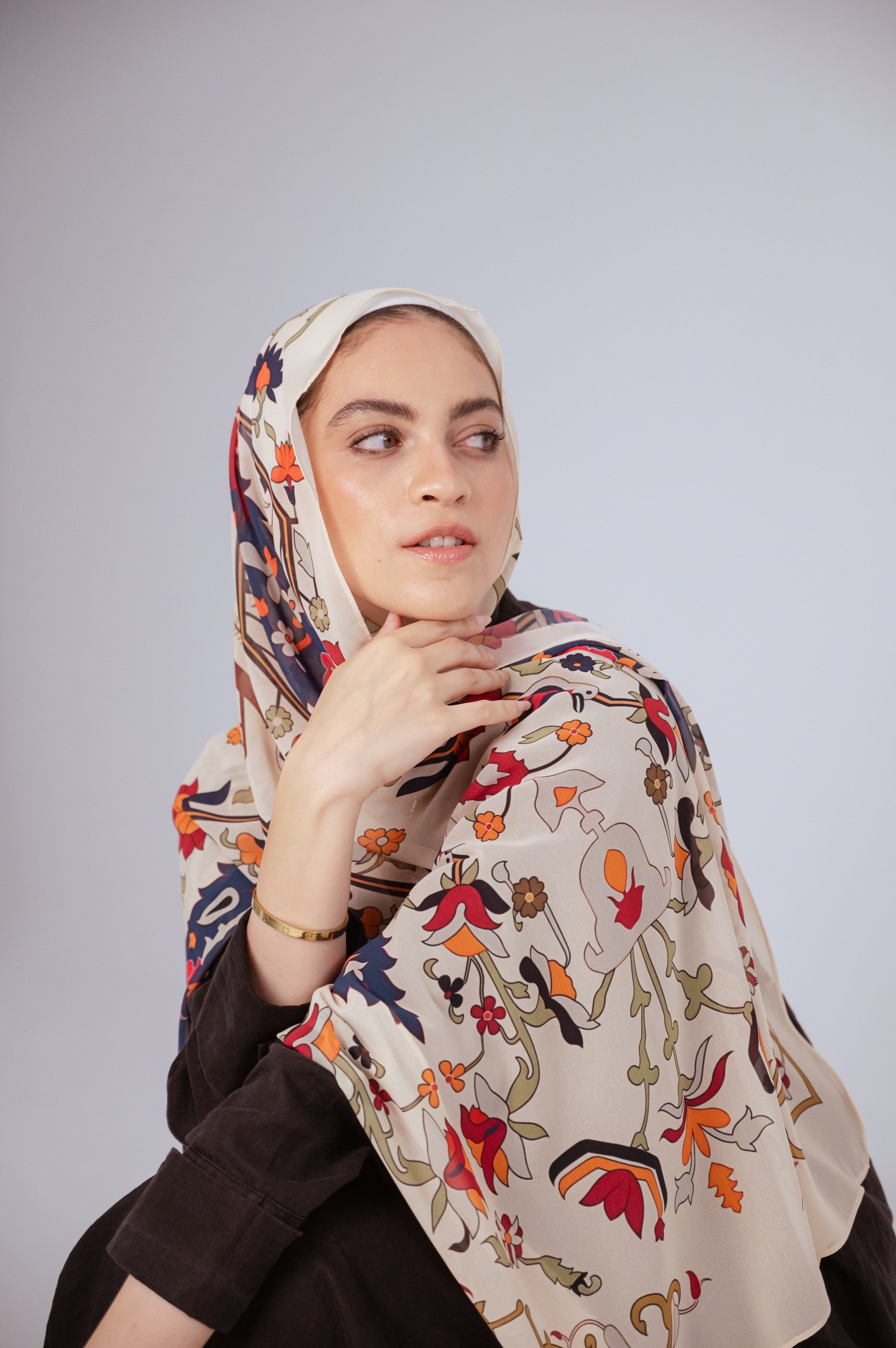 Model wearing the Andalus Drape luxury chiffon hijab in cream floral print – frontal view