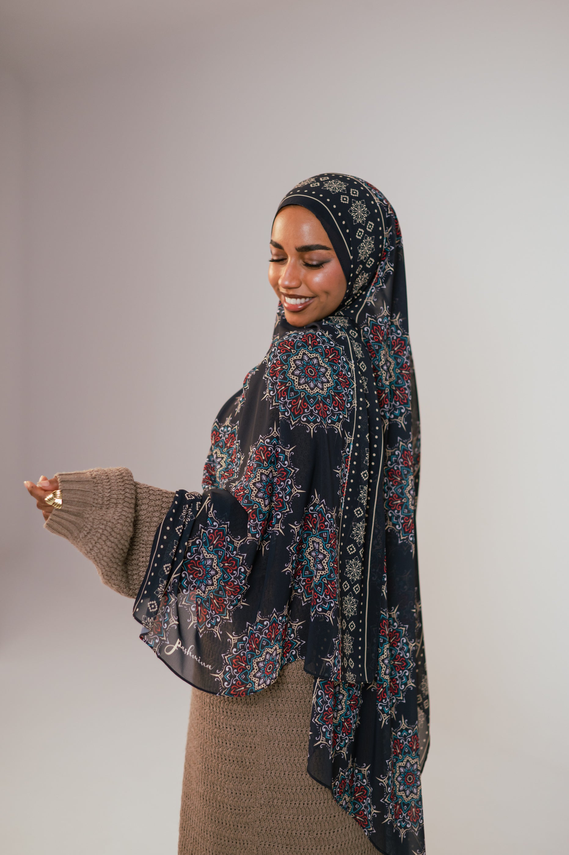 Back and side drape view of the Andalusia Luxury Chiffon Hijab, emphasizing the full pattern layout and graceful fall of the chiffon.