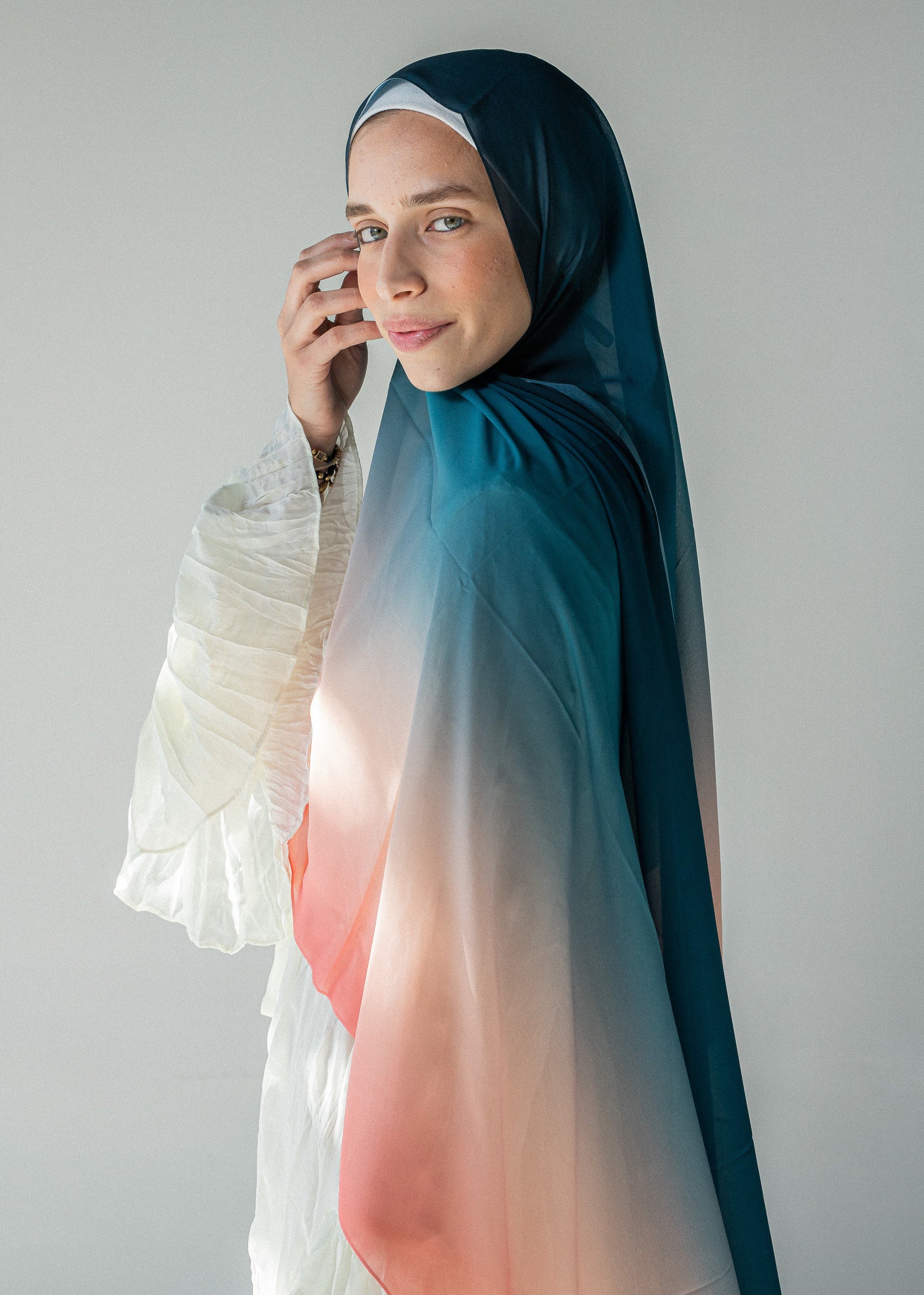Side view of Coral Horizon chiffon hijab showing ombré tones