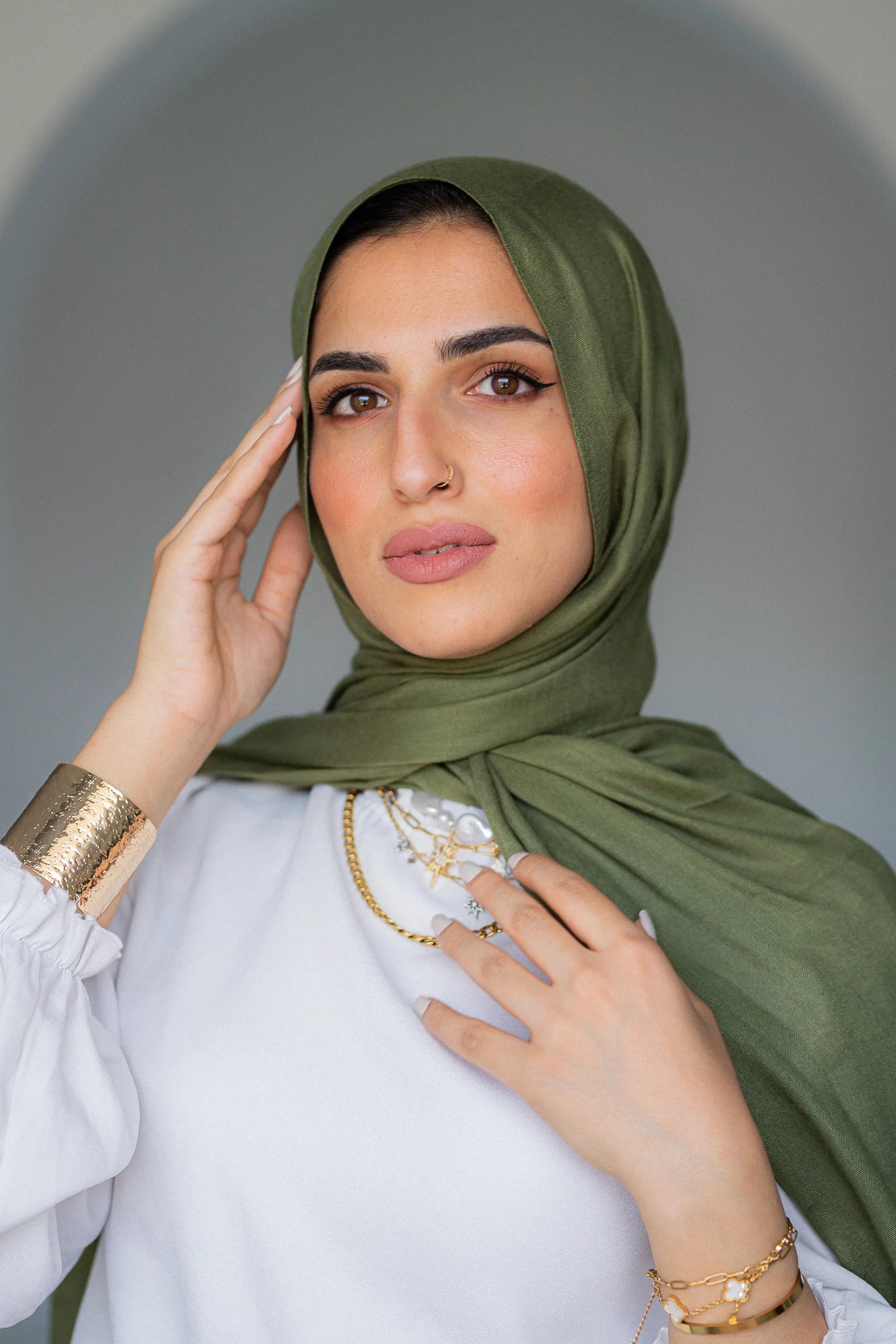 Olive green hijab styled in daylight, luxury modest fashion by Jaida