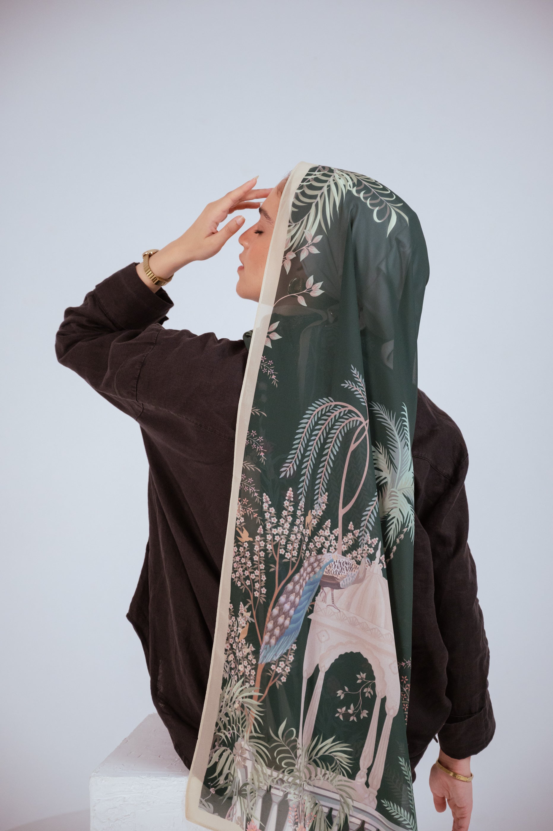 Side view of Emerald Garden chiffon hijab showing ivory arches and floral patterns