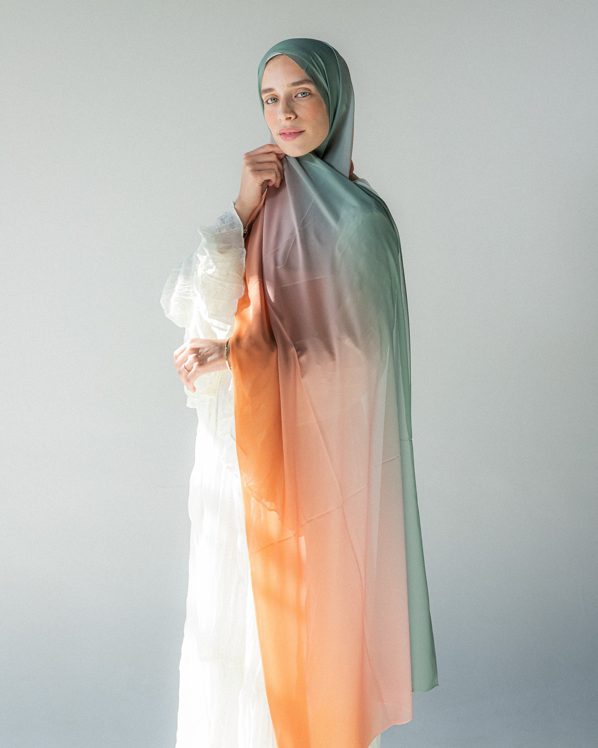 Jaida luxury chiffon hijab with soft olive-gold gradient – detail shot