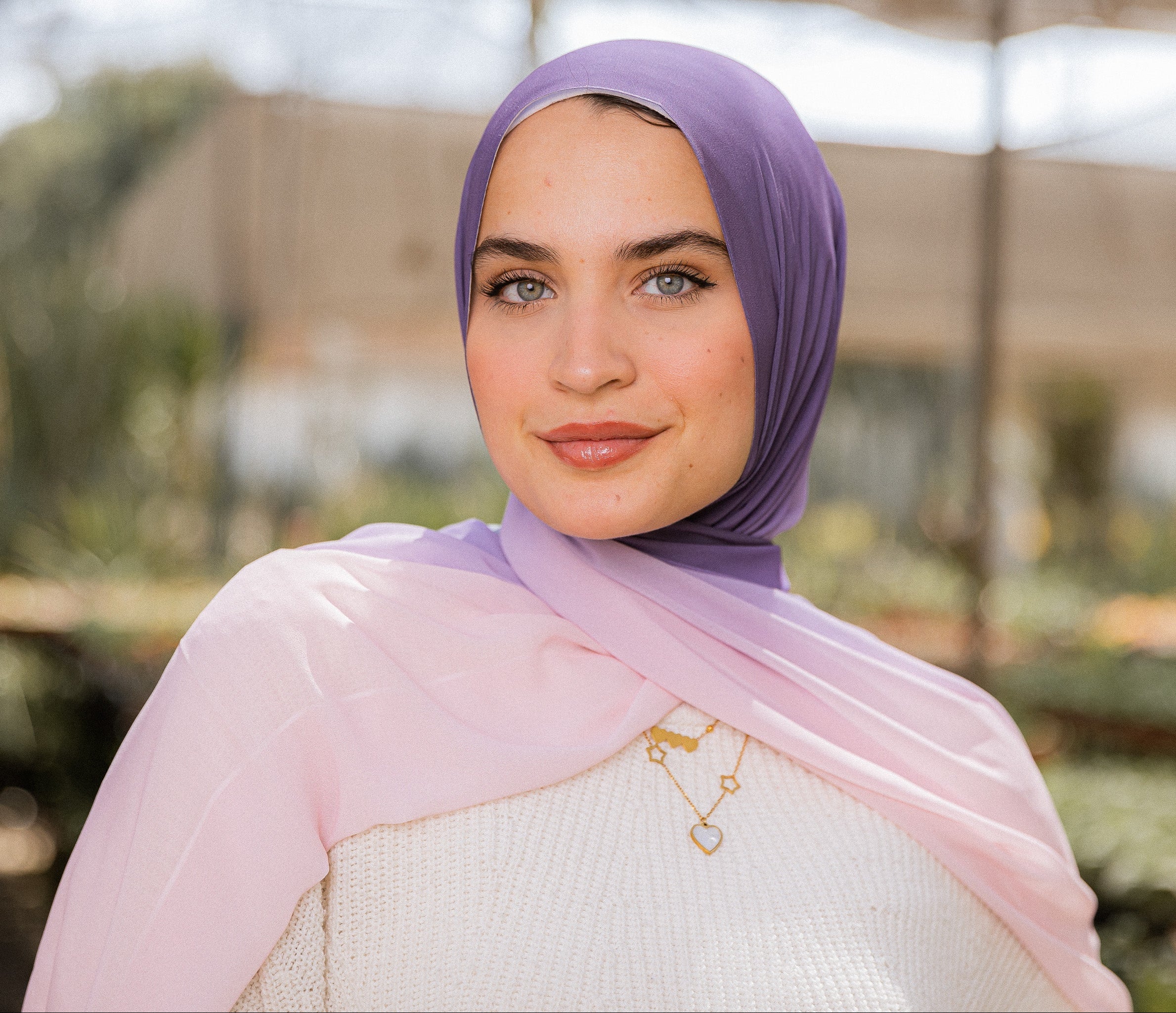 Model wearing Hushed Mauve chiffon hijab – gradient lilac to blush pink tones