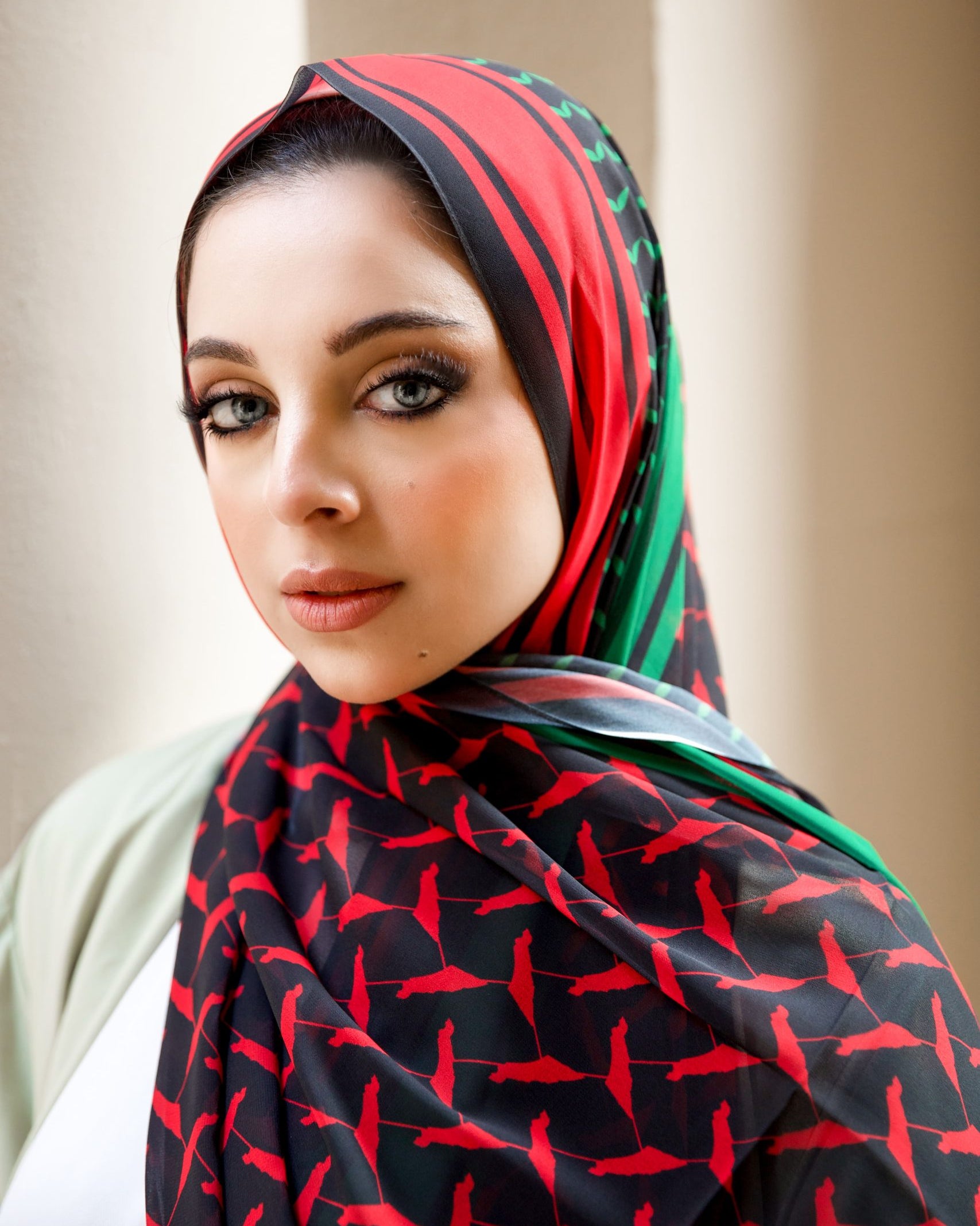 Close-up of Genin hijab highlighting chiffon texture and bold color detailing.