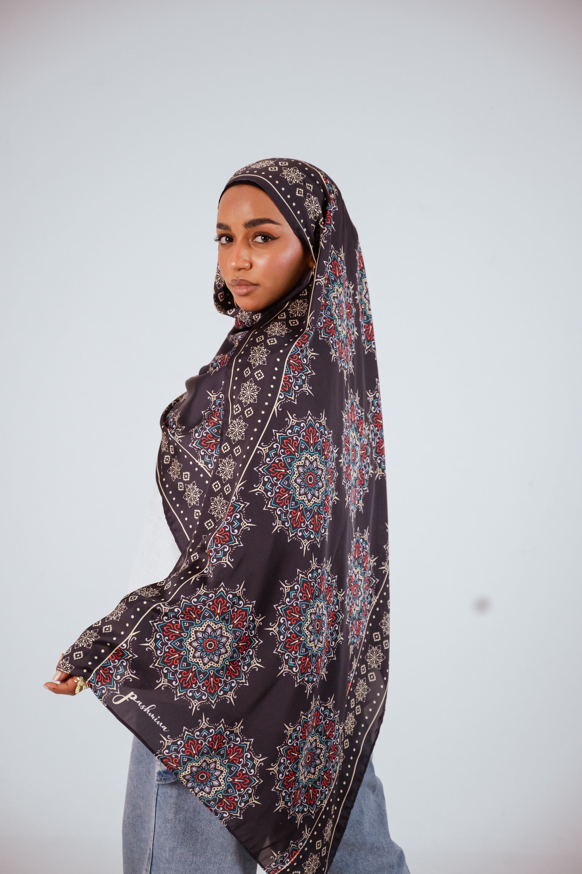 Side view of the Andalusia Satin Hijab showing full drape and geometric motifs.