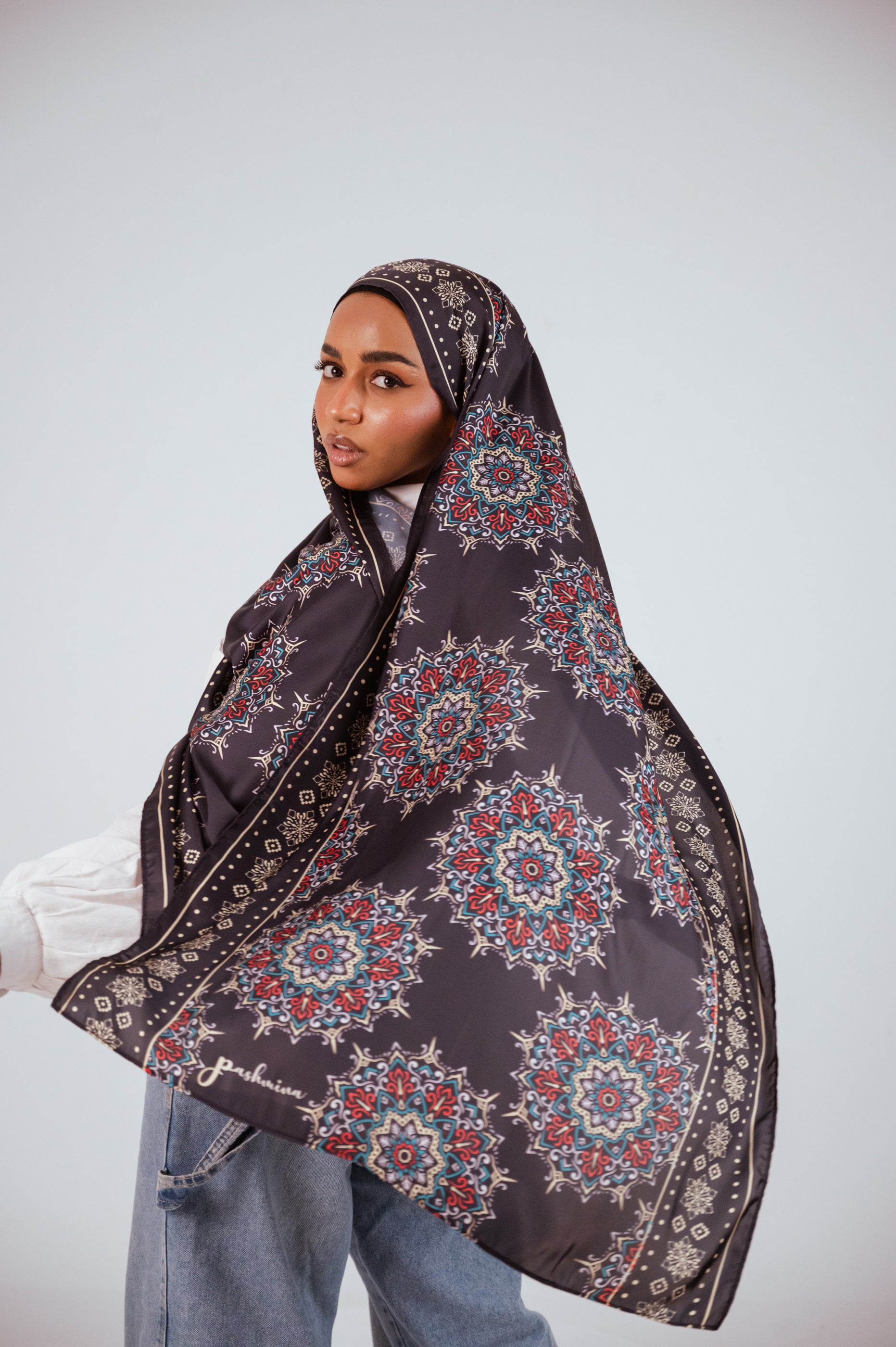 Model showcasing the flow and full coverage of the Andalusia Satin Hijab.