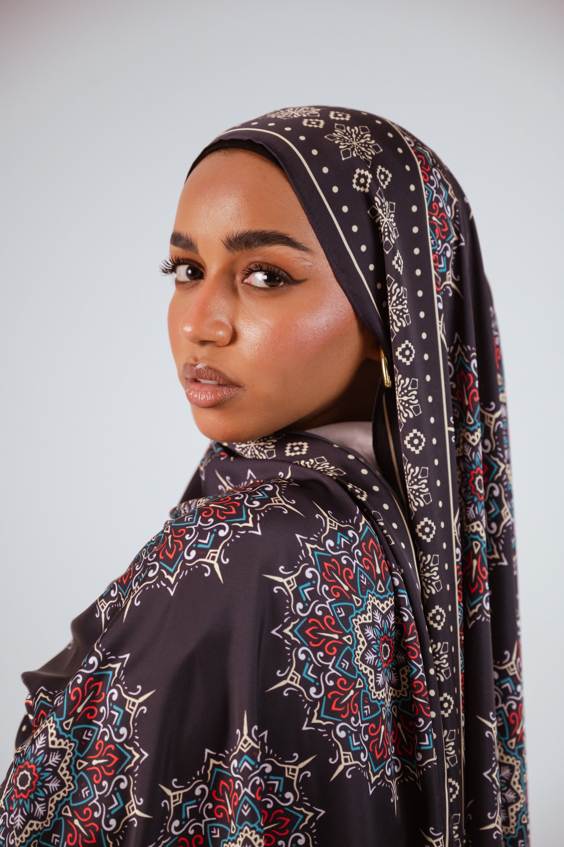 Profile view of the Andalusia Satin Hijab featuring matte satin finish.