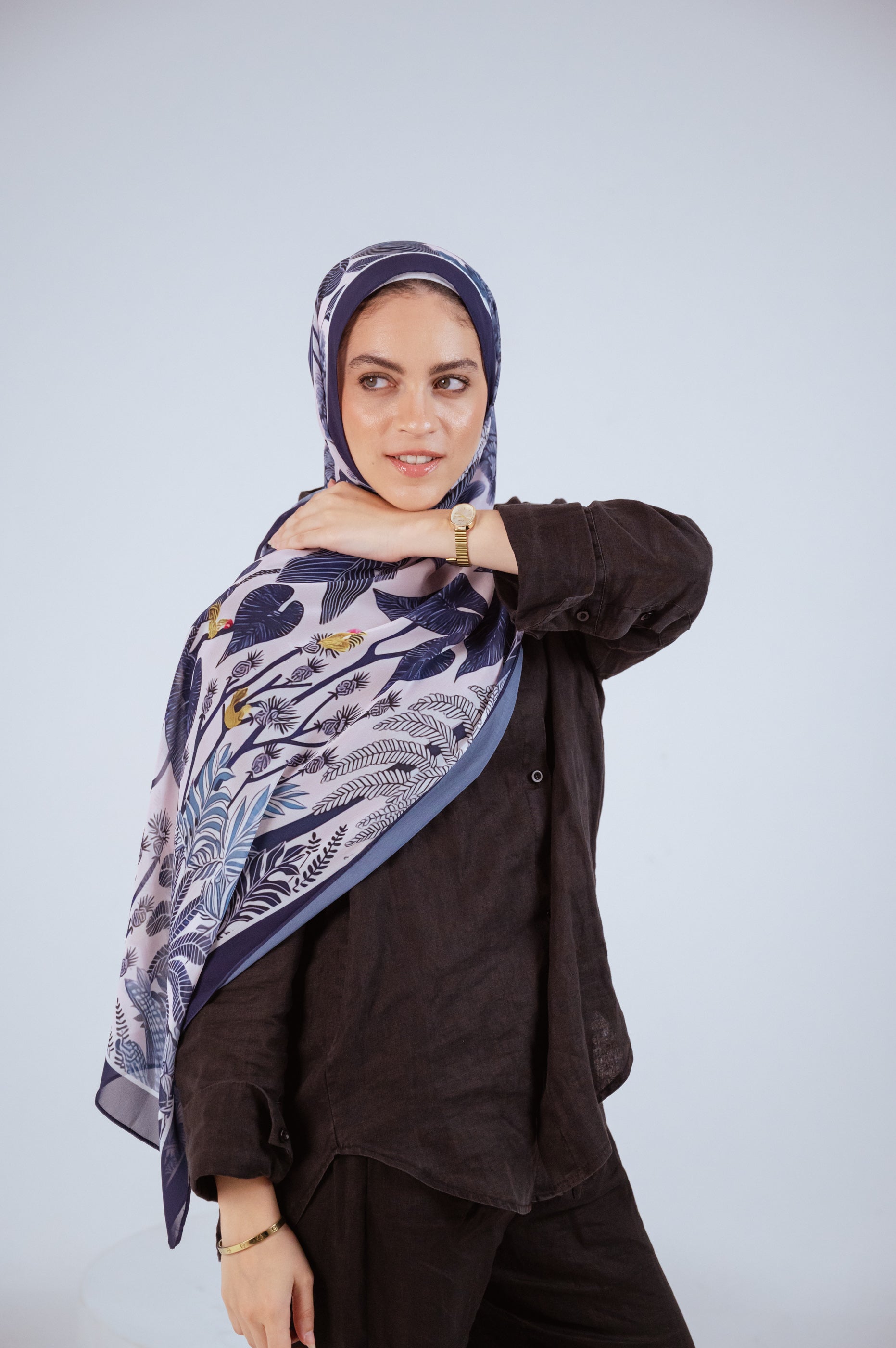 Model wearing Moonlight Oasis chiffon hijab – front view with navy and silver botanical print