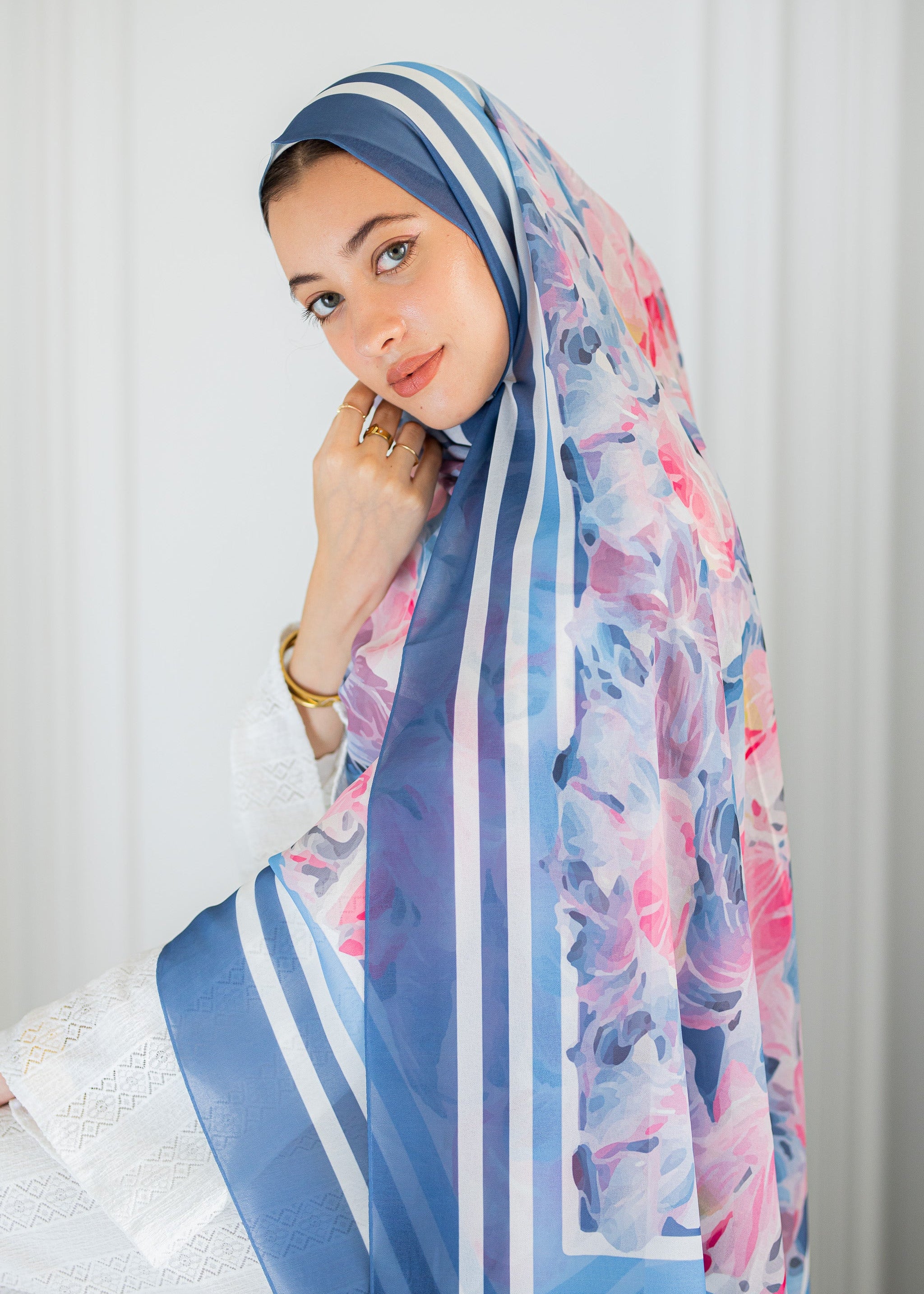 Model wearing Rose Petal Gelato chiffon hijab – soft pink and blue floral design