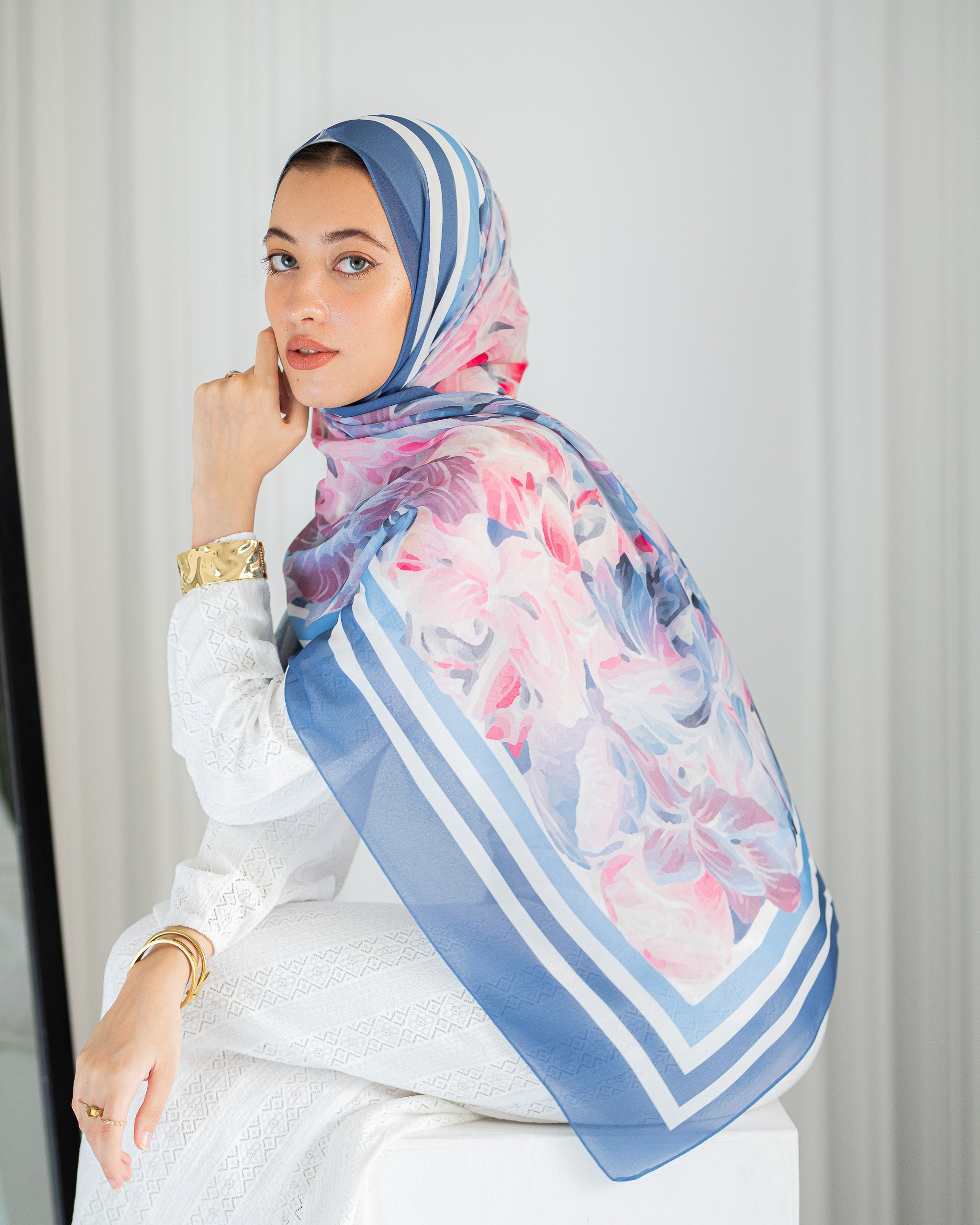 Model wearing Rose Petal Gelato chiffon hijab – soft pink and blue floral design