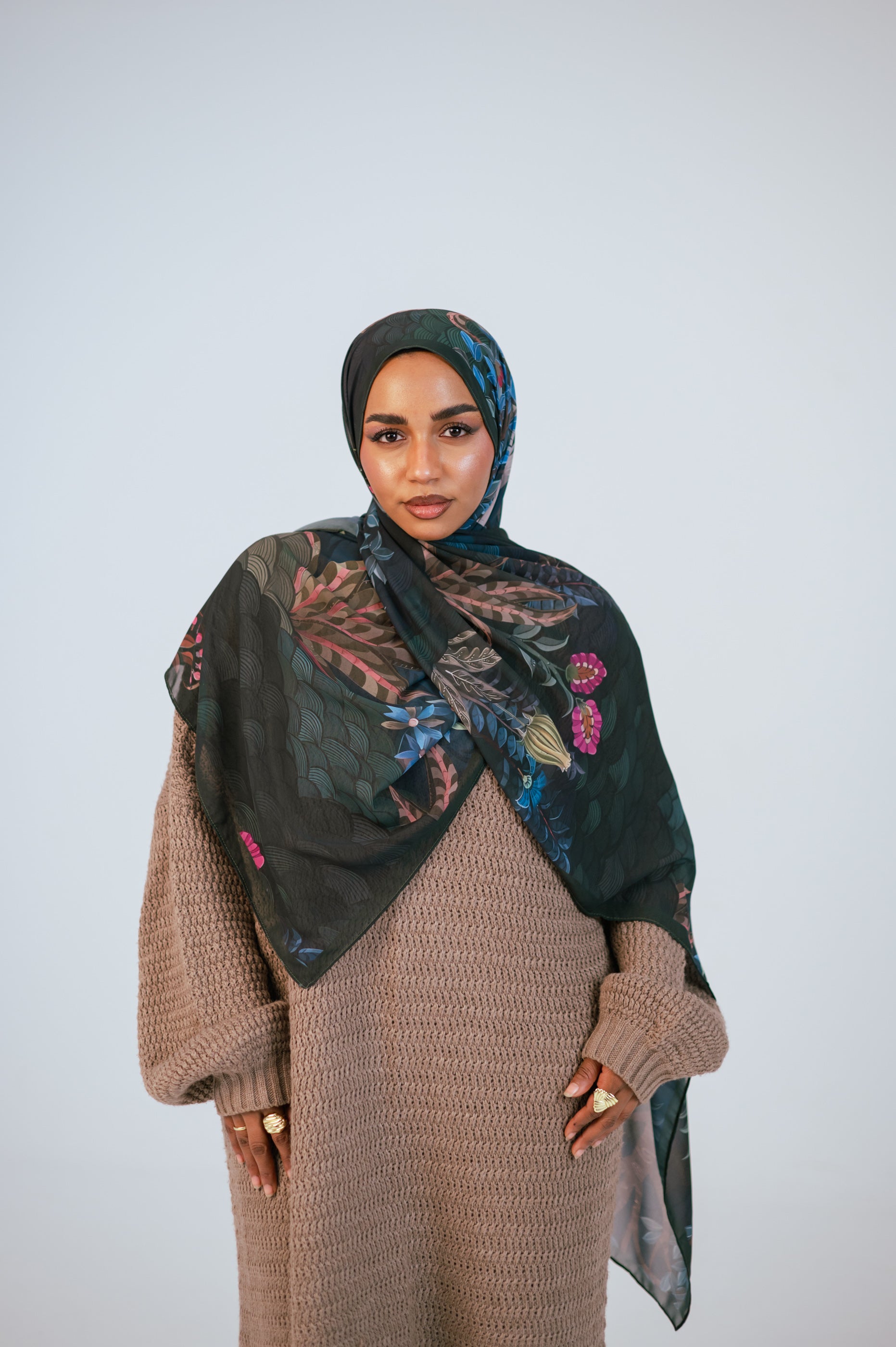 Secret Garden Luxury Chiffon Hijab – front view showcasing deep green floral print on model.
