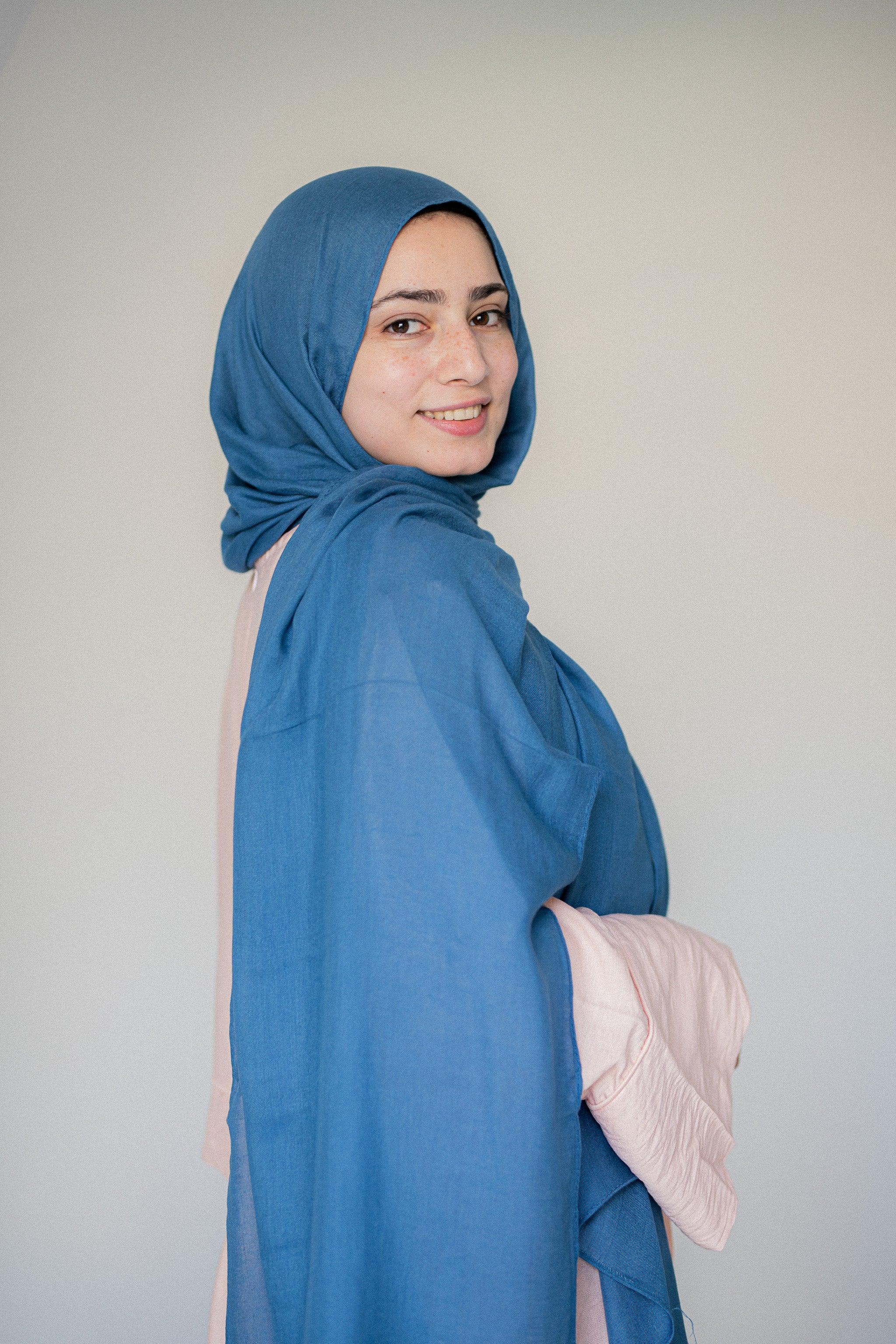 Side profile view of Tidemist Modal Cotton Hijab in light blue drape
