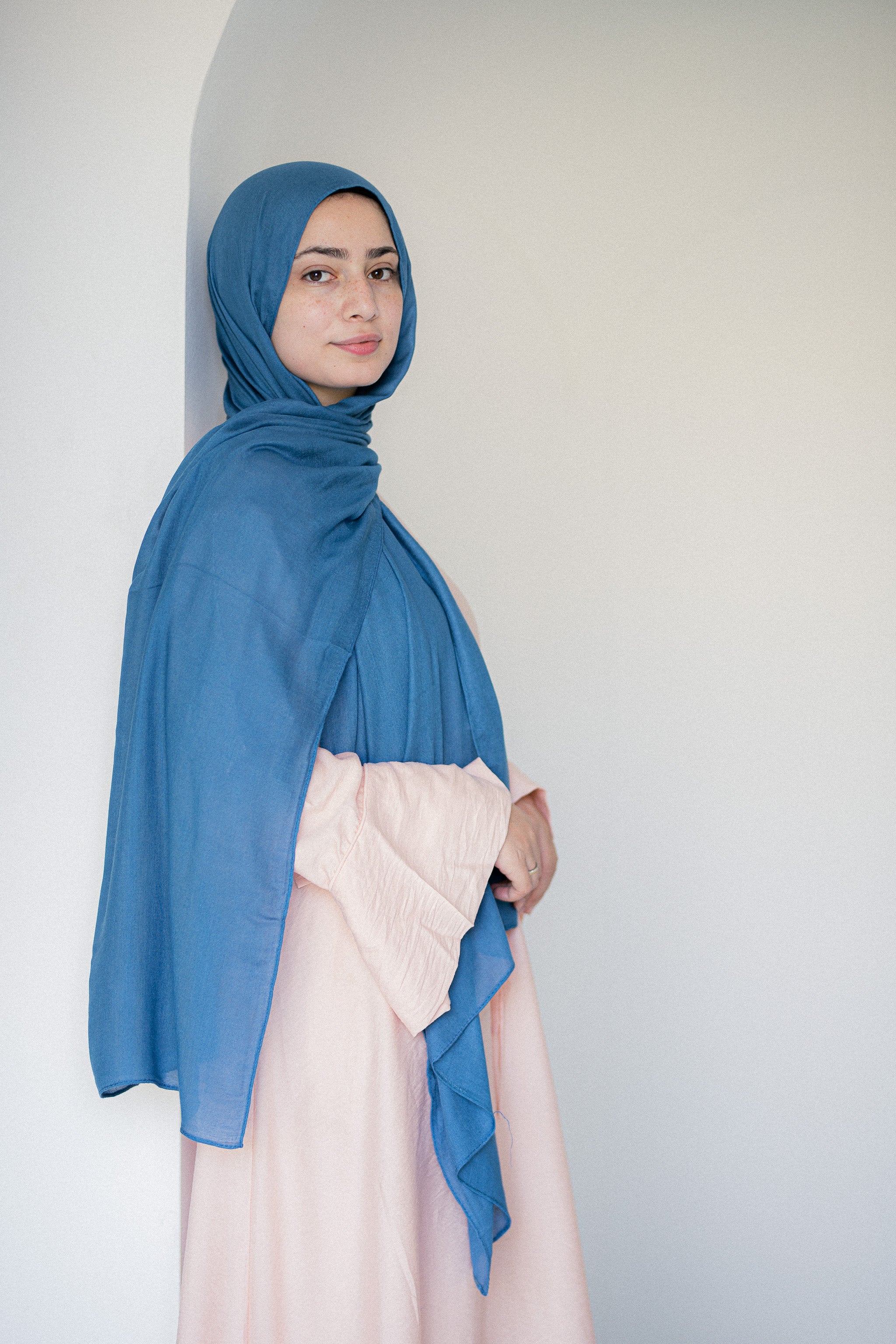 Side profile view of Tidemist Modal Cotton Hijab in light blue drape