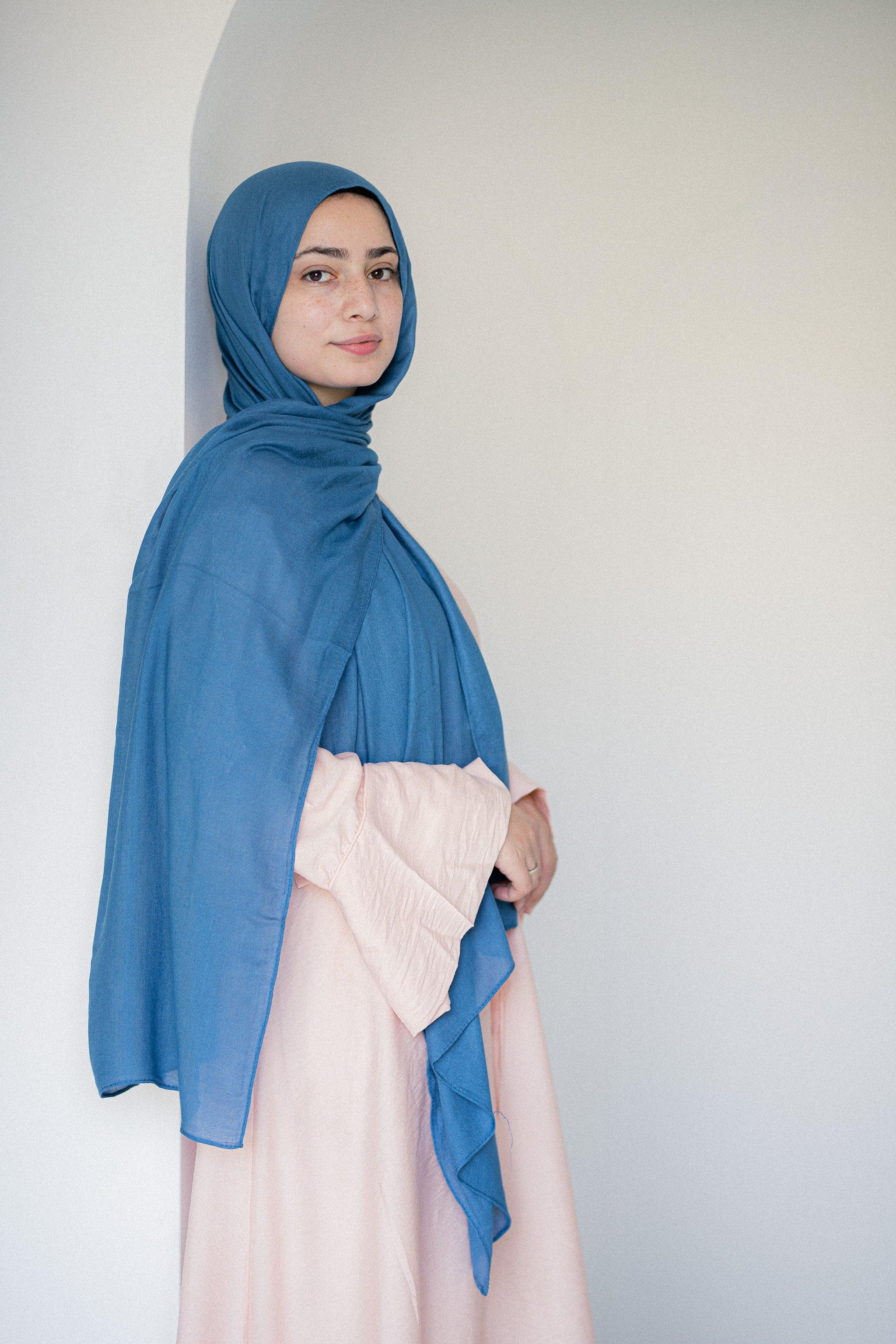 Side profile view of Tidemist Modal Cotton Hijab in light blue drape