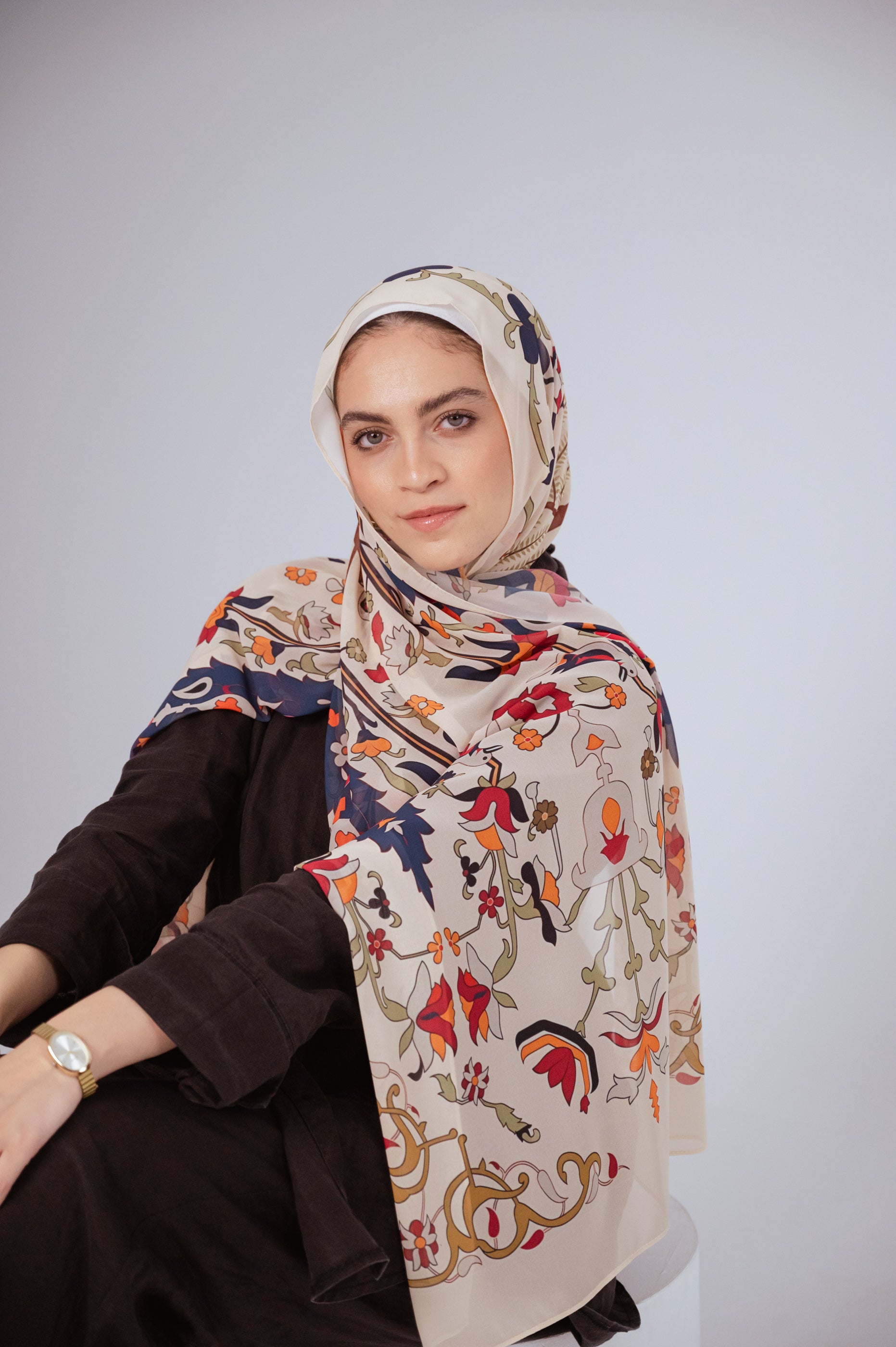 Model wearing the Andalus Drape luxury chiffon hijab in cream floral print – frontal view