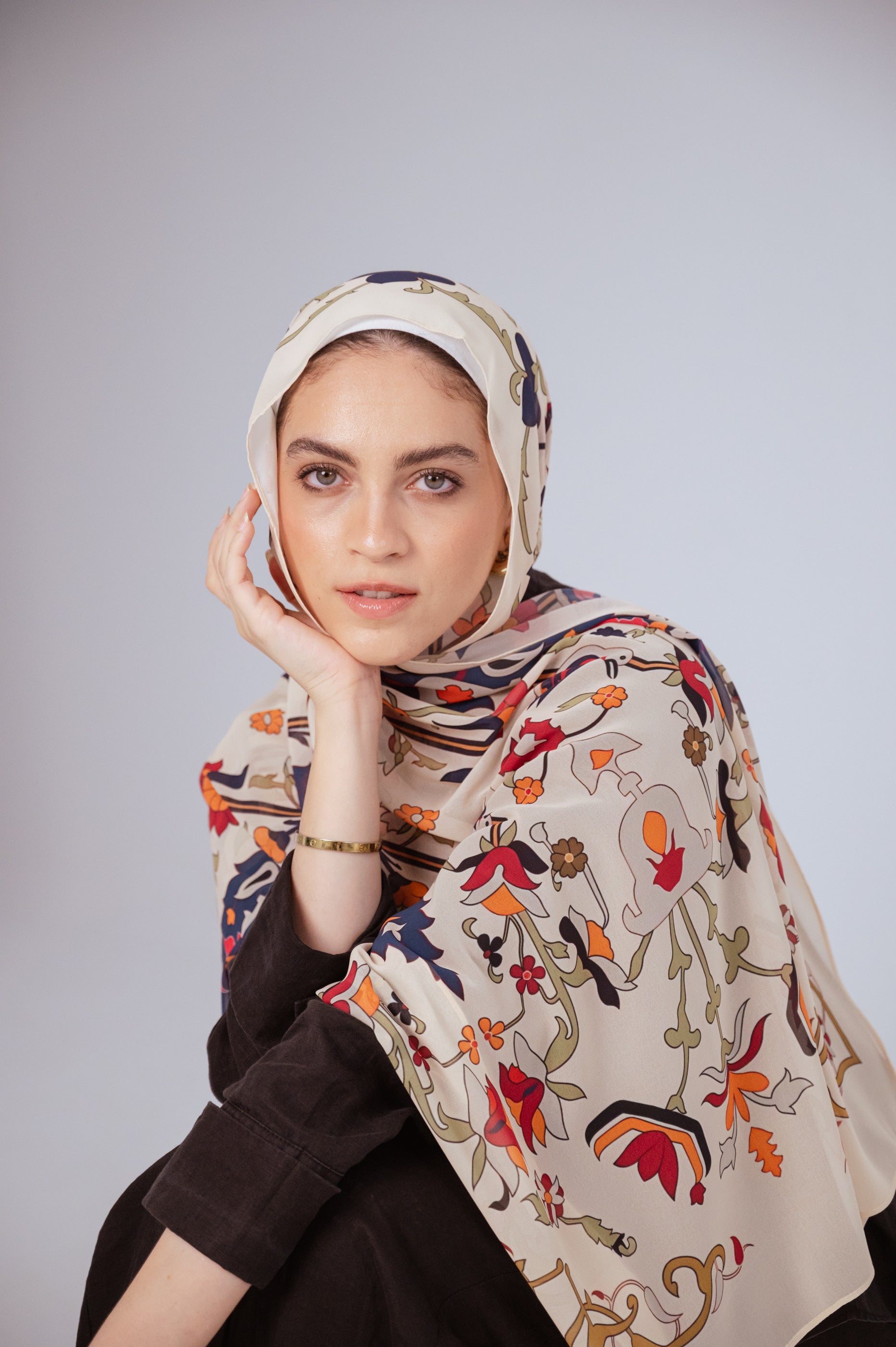 Model wearing the Andalus Drape luxury chiffon hijab in cream floral print – frontal view