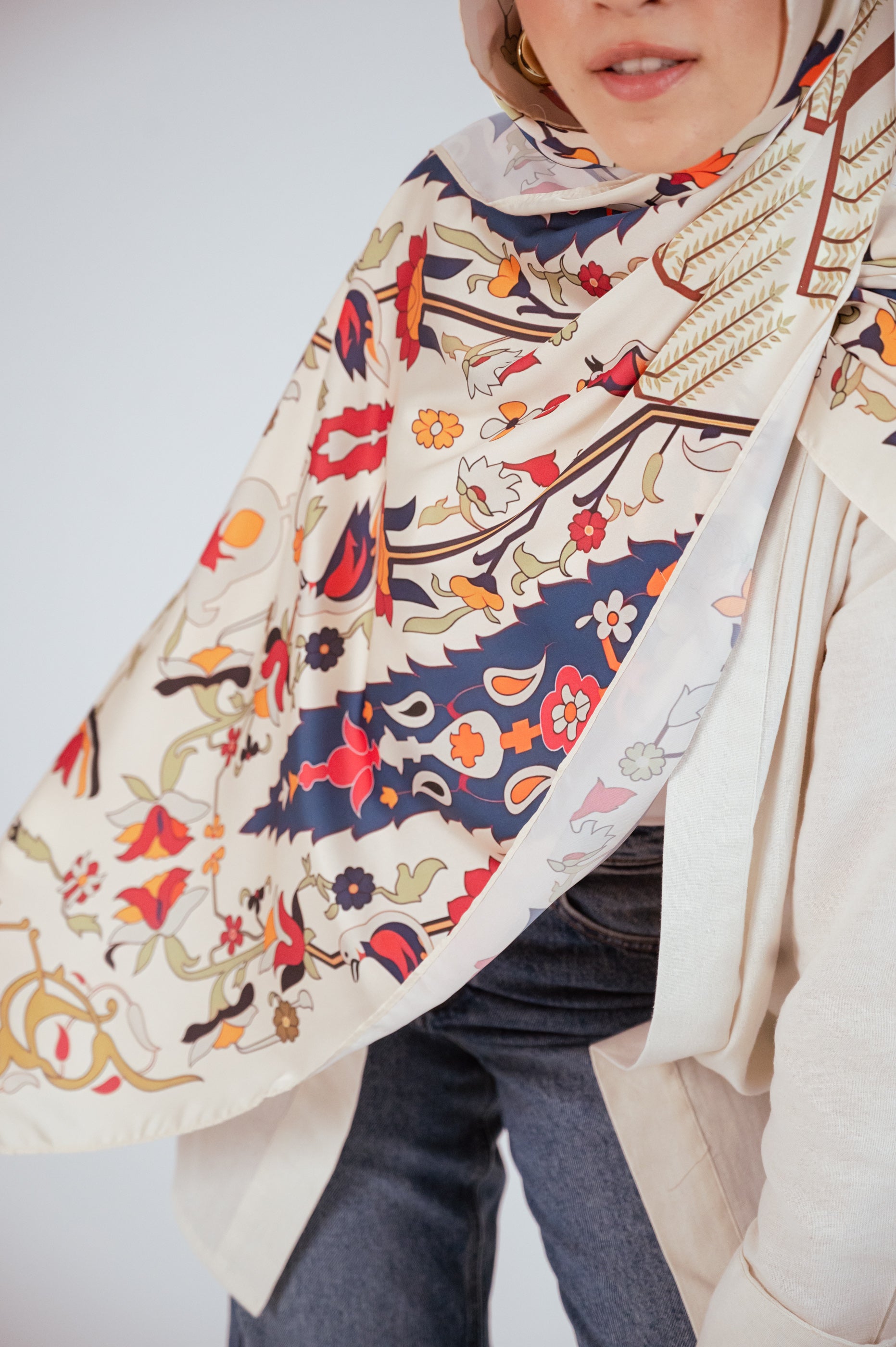 Close-up of the Andalus Satin Hijab fabric showing detailed Andalusian-inspired motifs