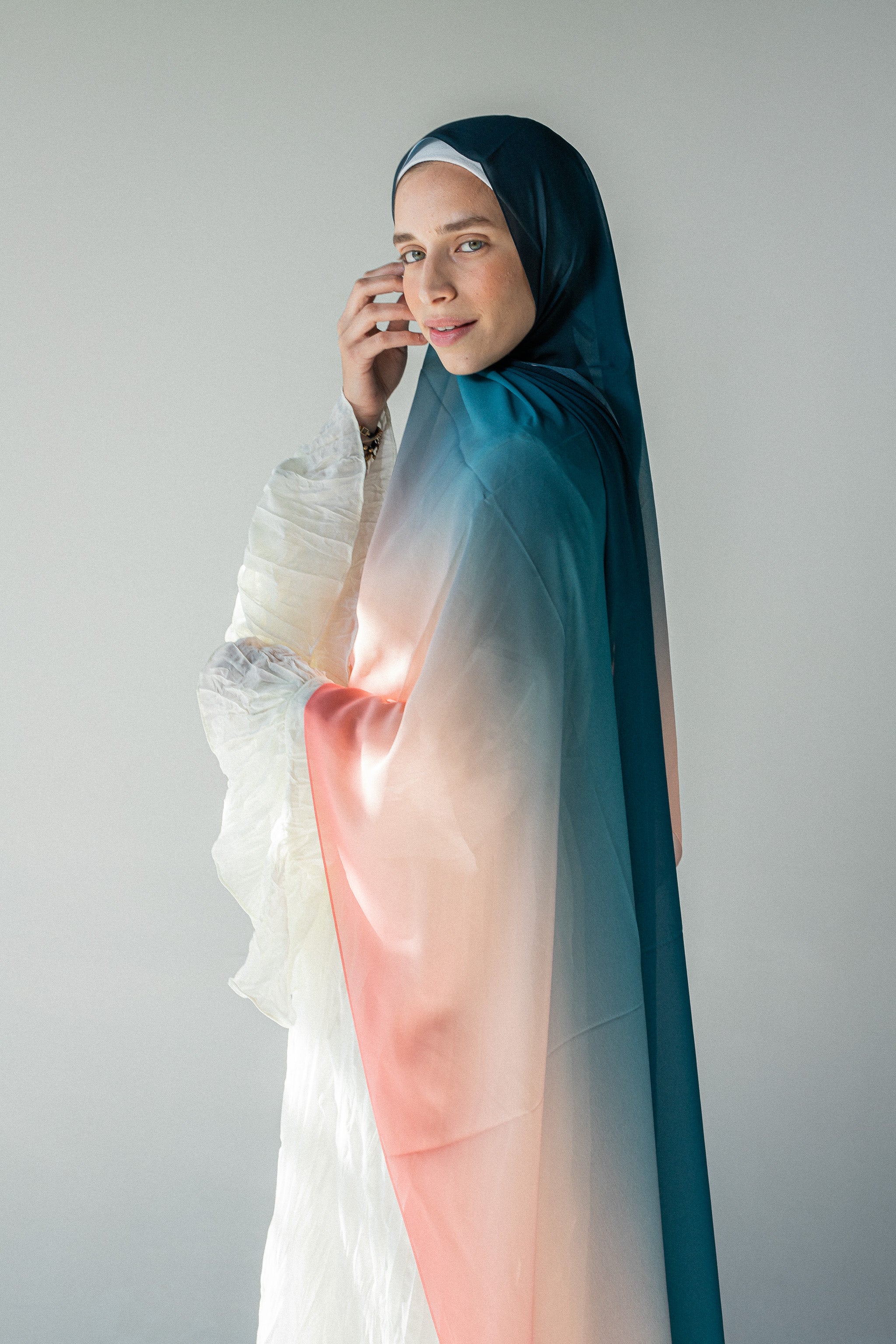 Side view of Coral Horizon chiffon hijab showing ombré tones