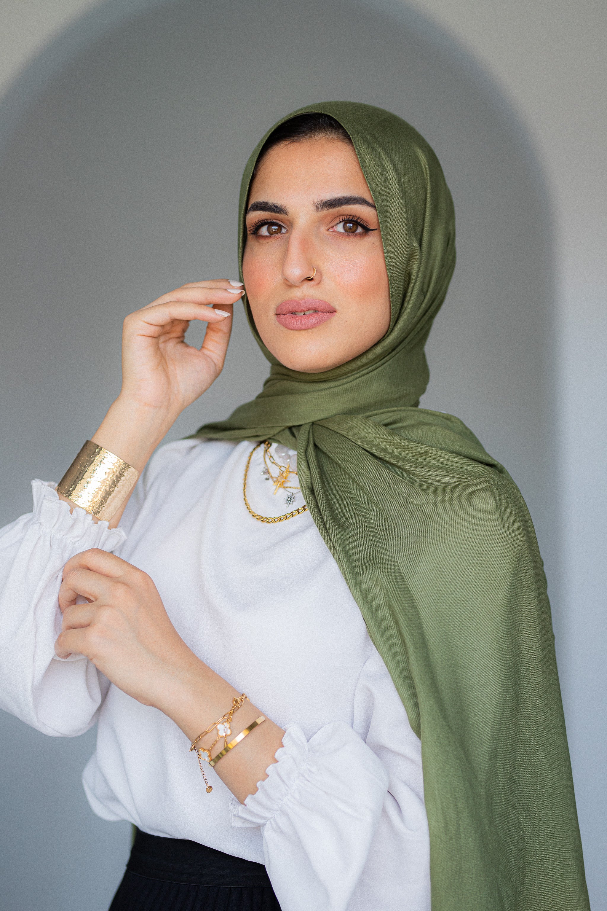 Elysian Zaytūn Modal Cotton Hijab – olive green hijab draped on a model