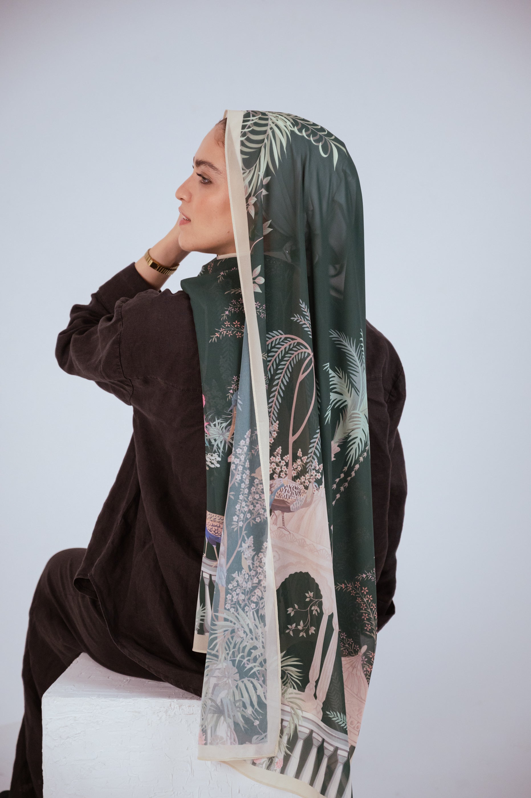 Side view of Emerald Garden chiffon hijab showing ivory arches and floral patterns