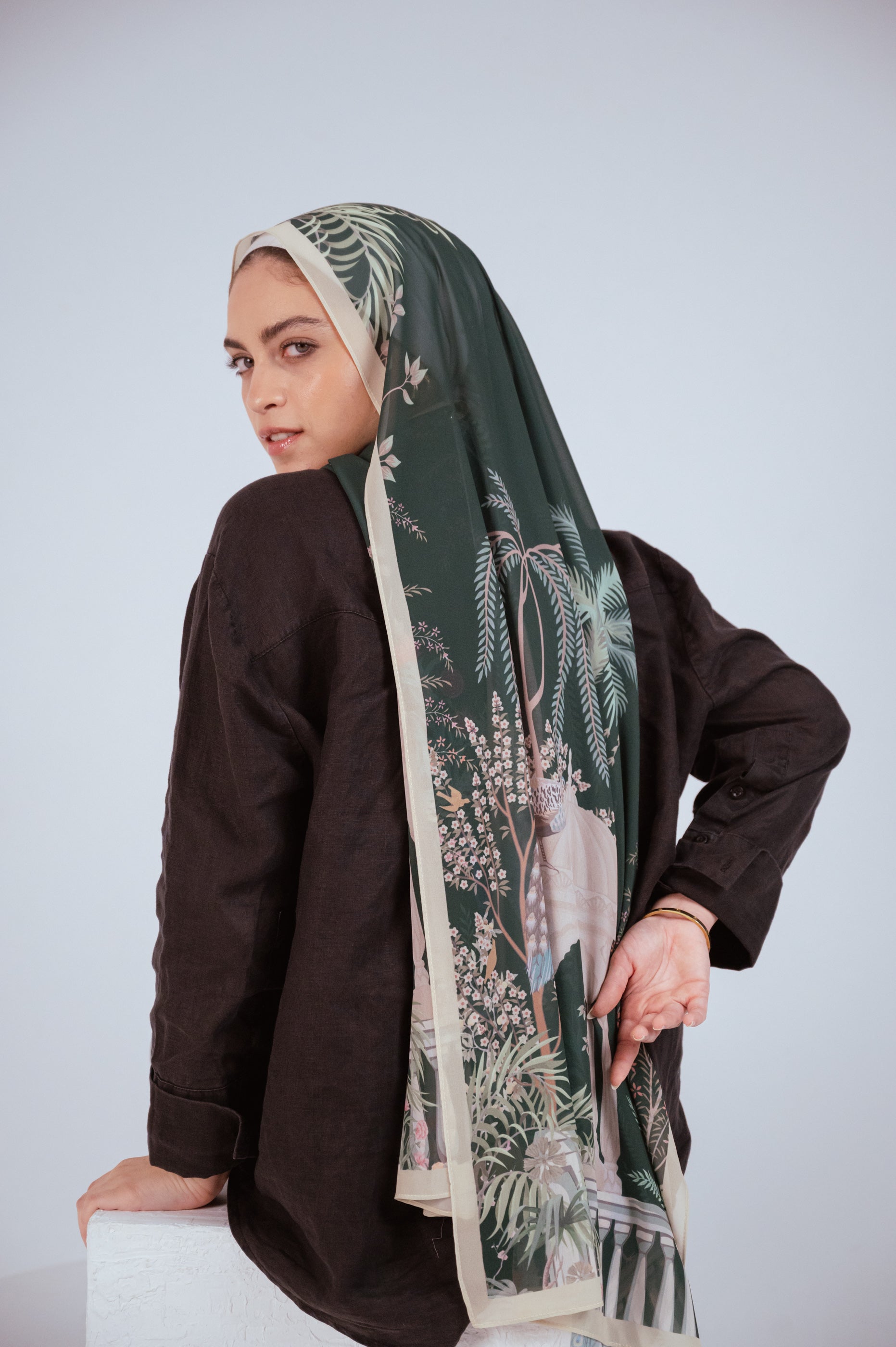 Side view of Emerald Garden chiffon hijab showing ivory arches and floral patterns