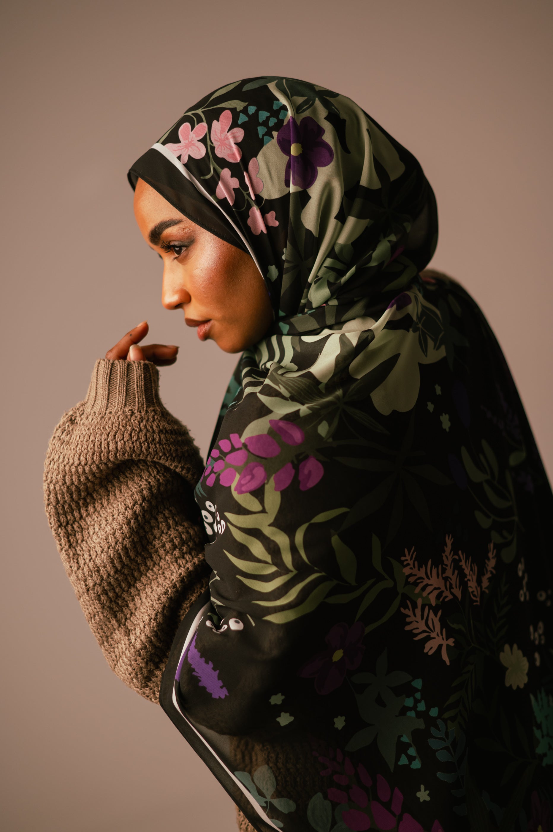 Close-up side angle of the Garden of Whispers chiffon hijab, focusing on the pink and purple floral details.