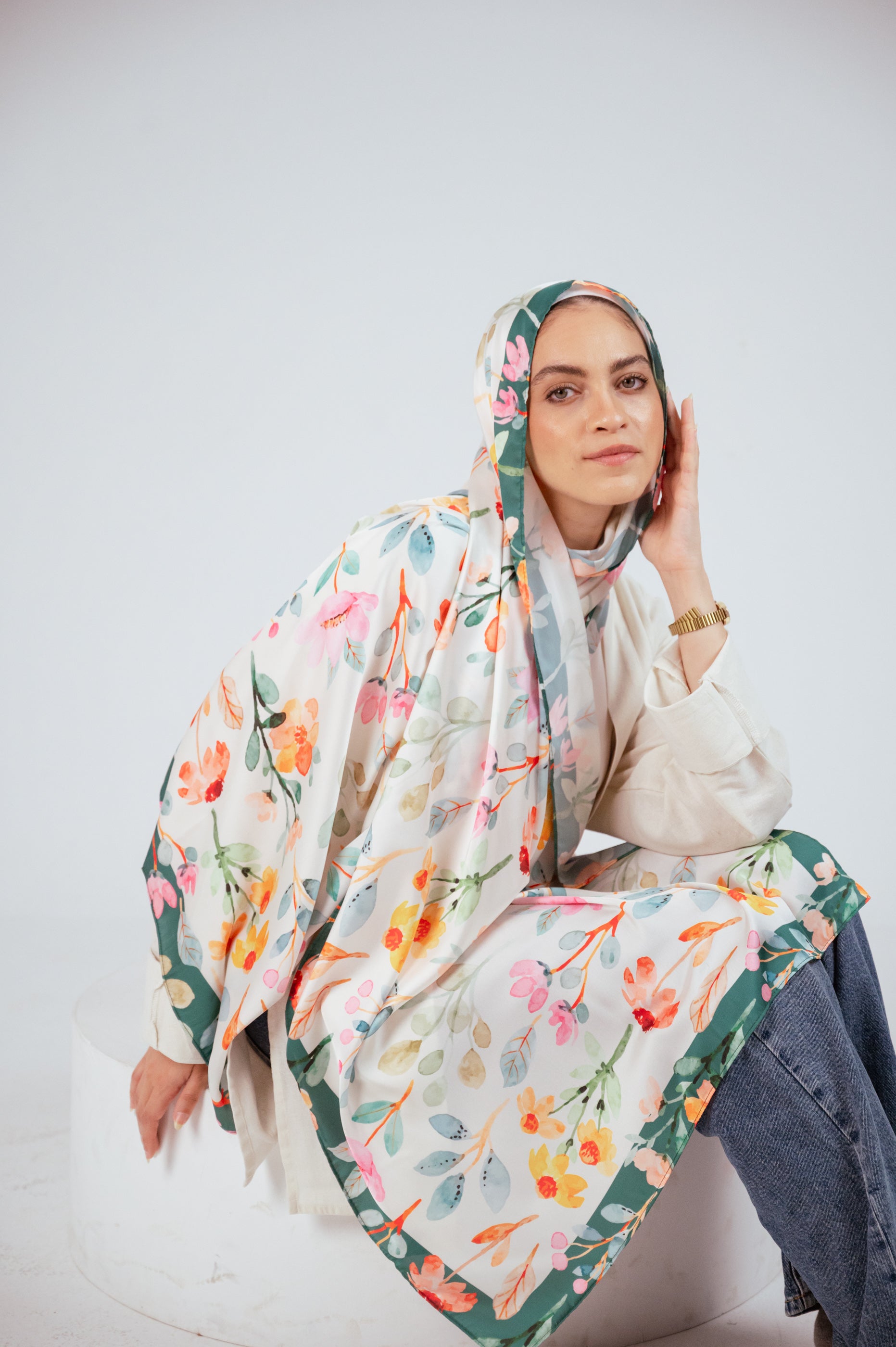 Side angle of Blooms of Hope – Luxury Satin Hijab, focus on floral pattern and glossy satin finish.
