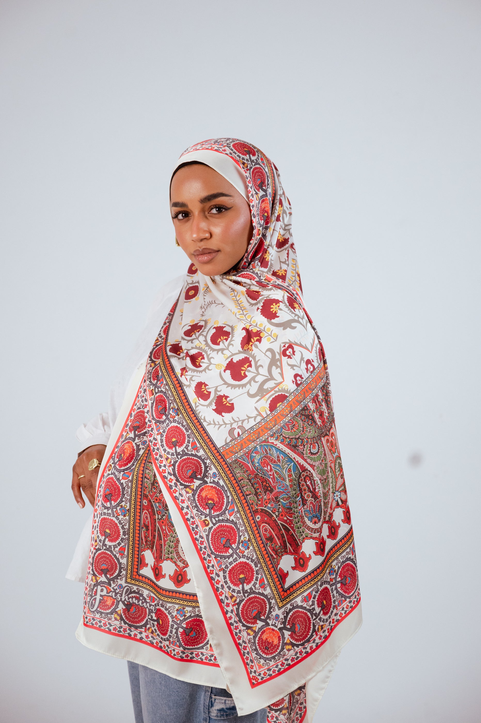 Model wearing Cairo Nights Satin Hijab – side pose showcasing full print