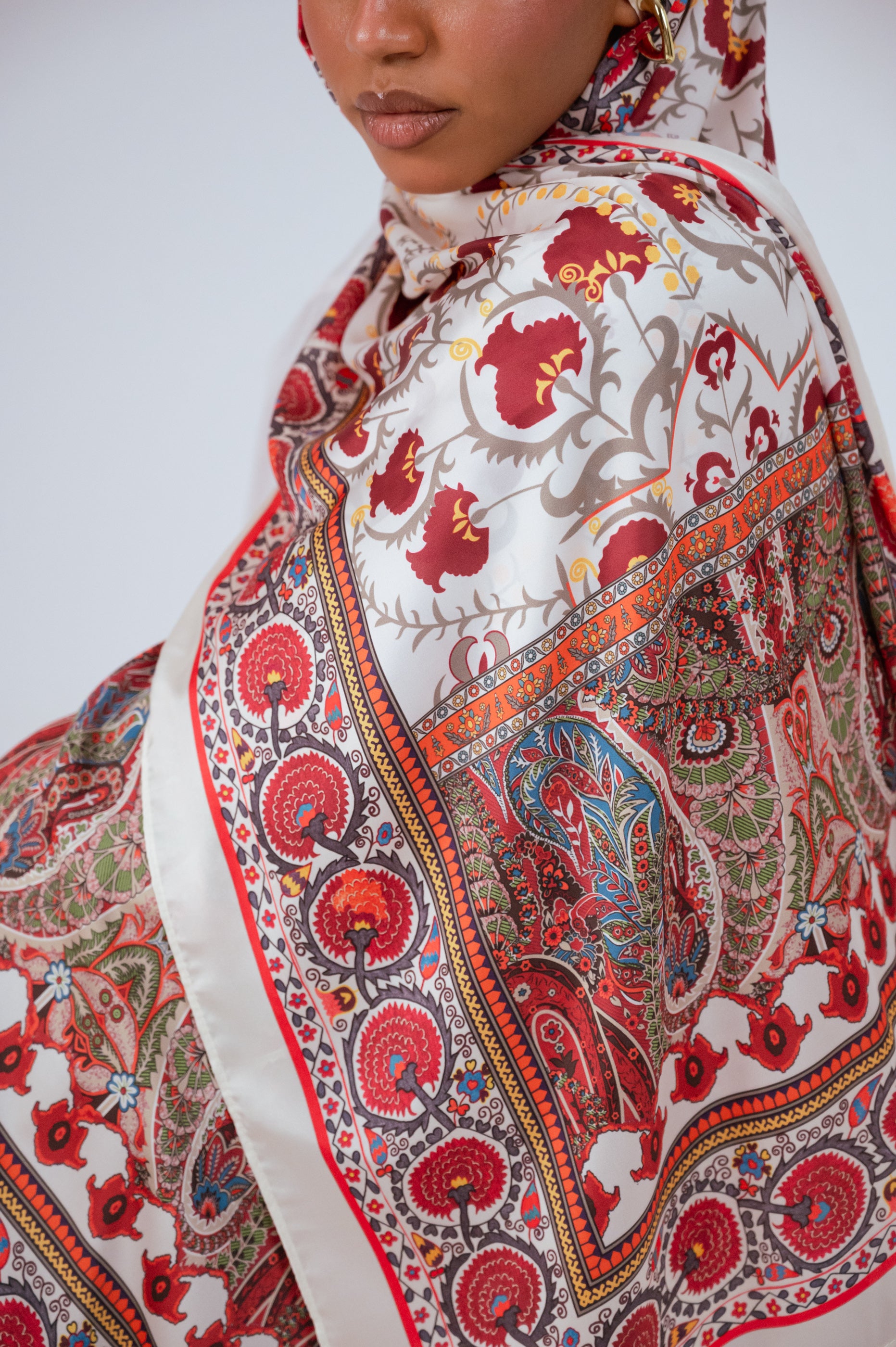 Detailed macro shot of the Cairo Nights satin fabric and rich colours