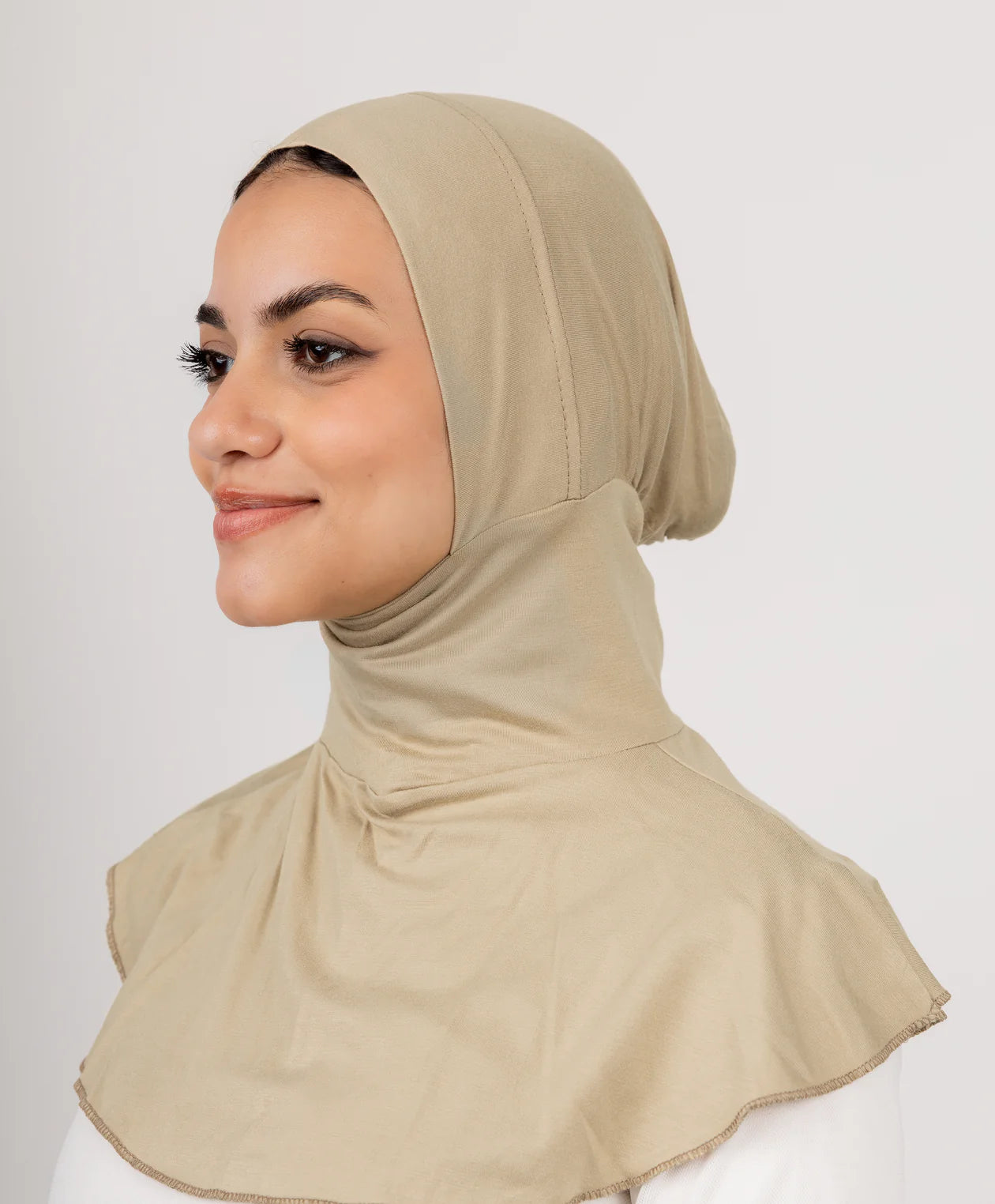JAIDA Full Neck Underscarf in beige cotton lycra, full neck undercap for modest layering and secure hijab base.