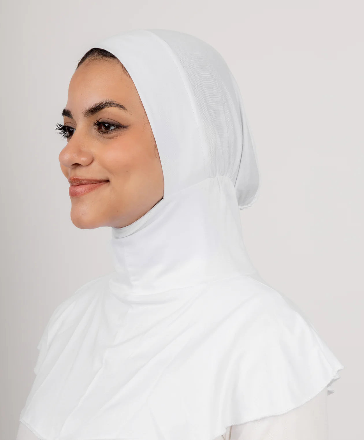 JAIDA Full Neck Underscarf in white cotton lycra, side profile showing full neck coverage undercap for hijab styling.