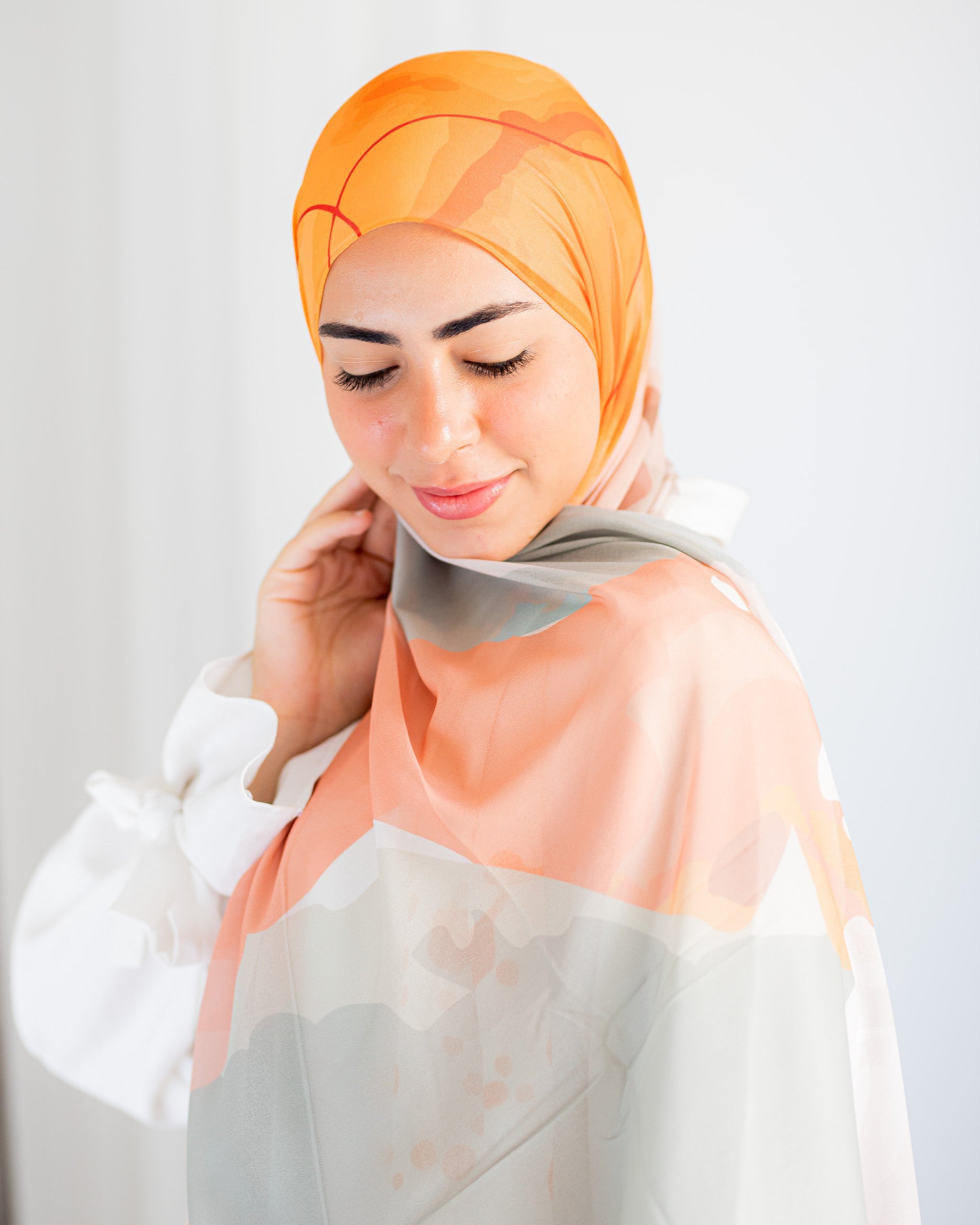 Maple Moon Luxury Chiffon Hijab – Warm Sage and Orange Print