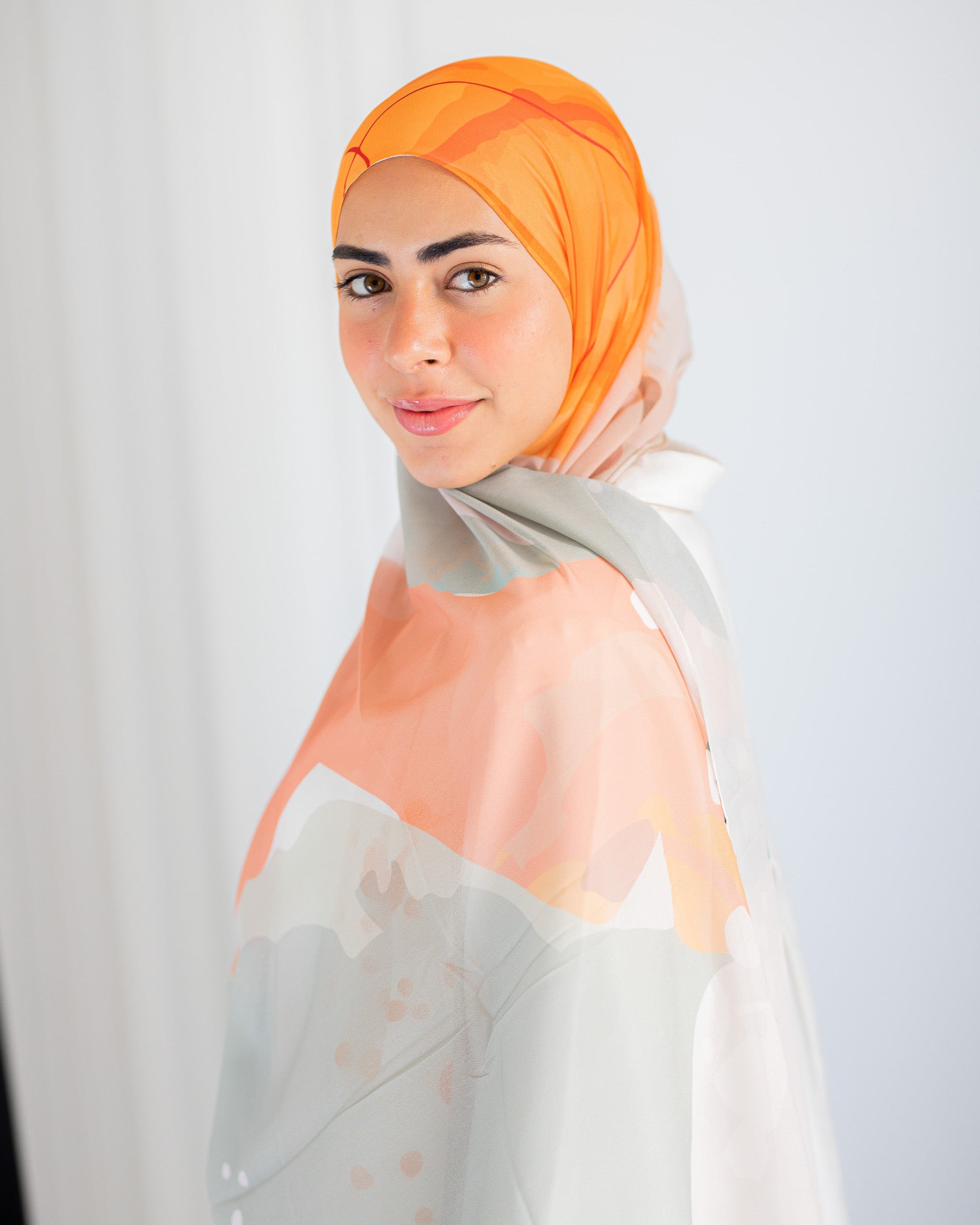 Maple Moon Luxury Chiffon Hijab – Warm Sage and Orange Print