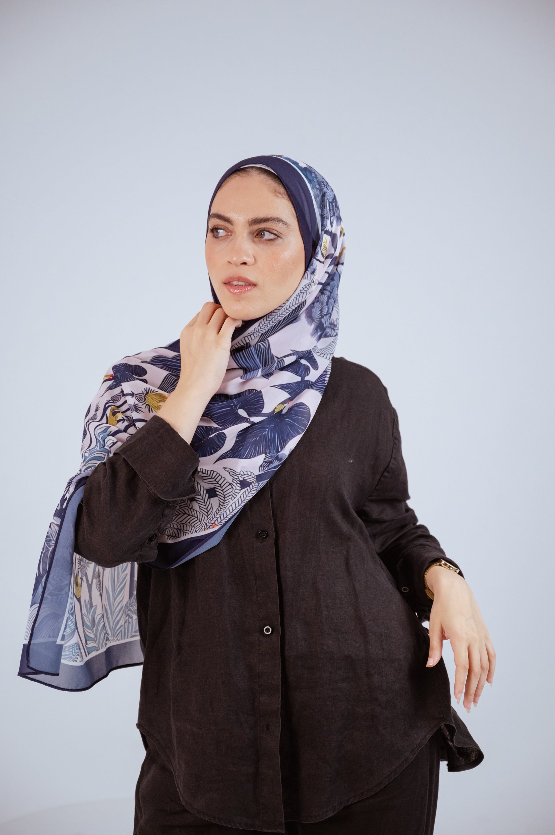Model wearing Moonlight Oasis chiffon hijab – front view with navy and silver botanical print