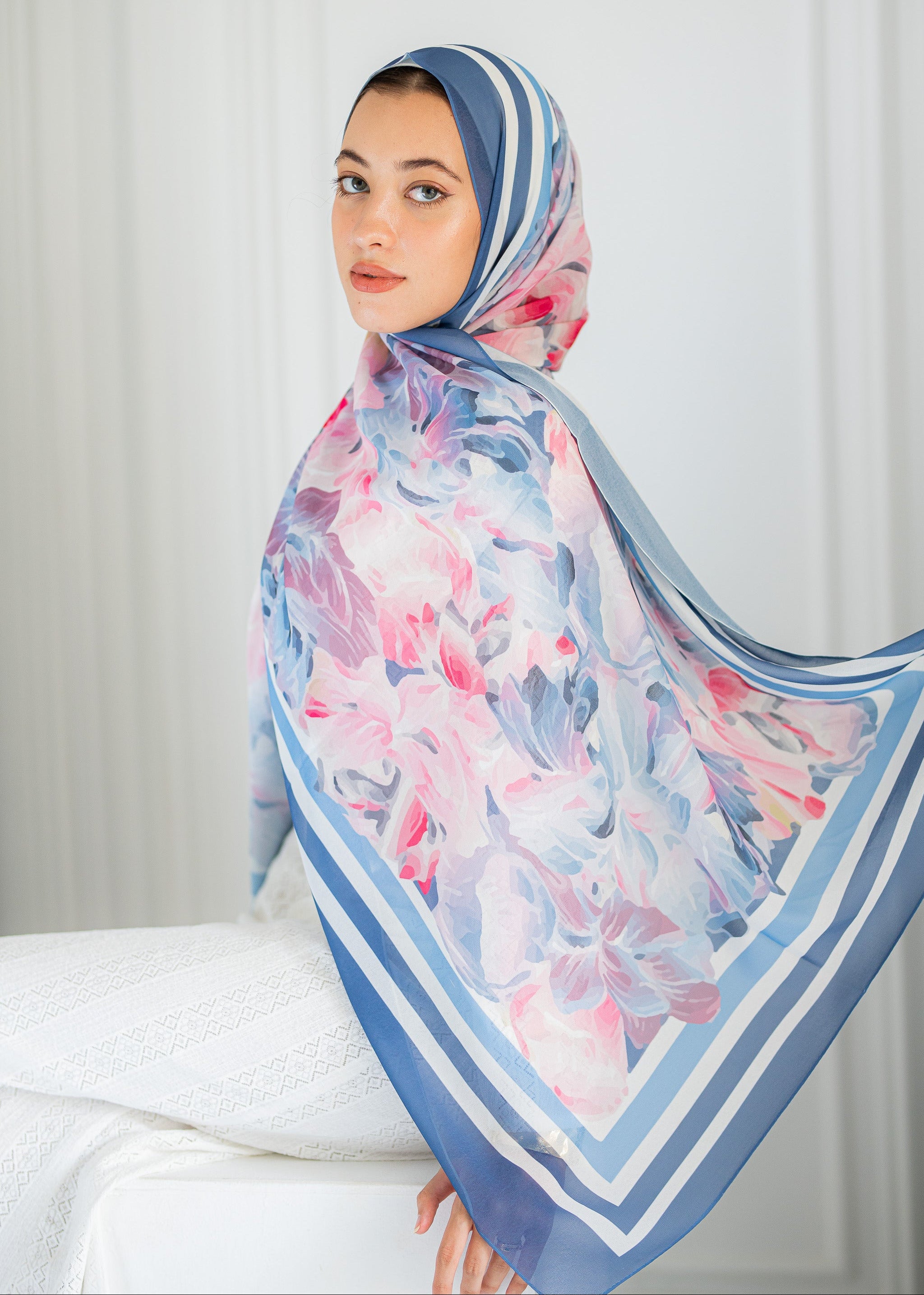 Model wearing Rose Petal Gelato chiffon hijab – soft pink and blue floral design