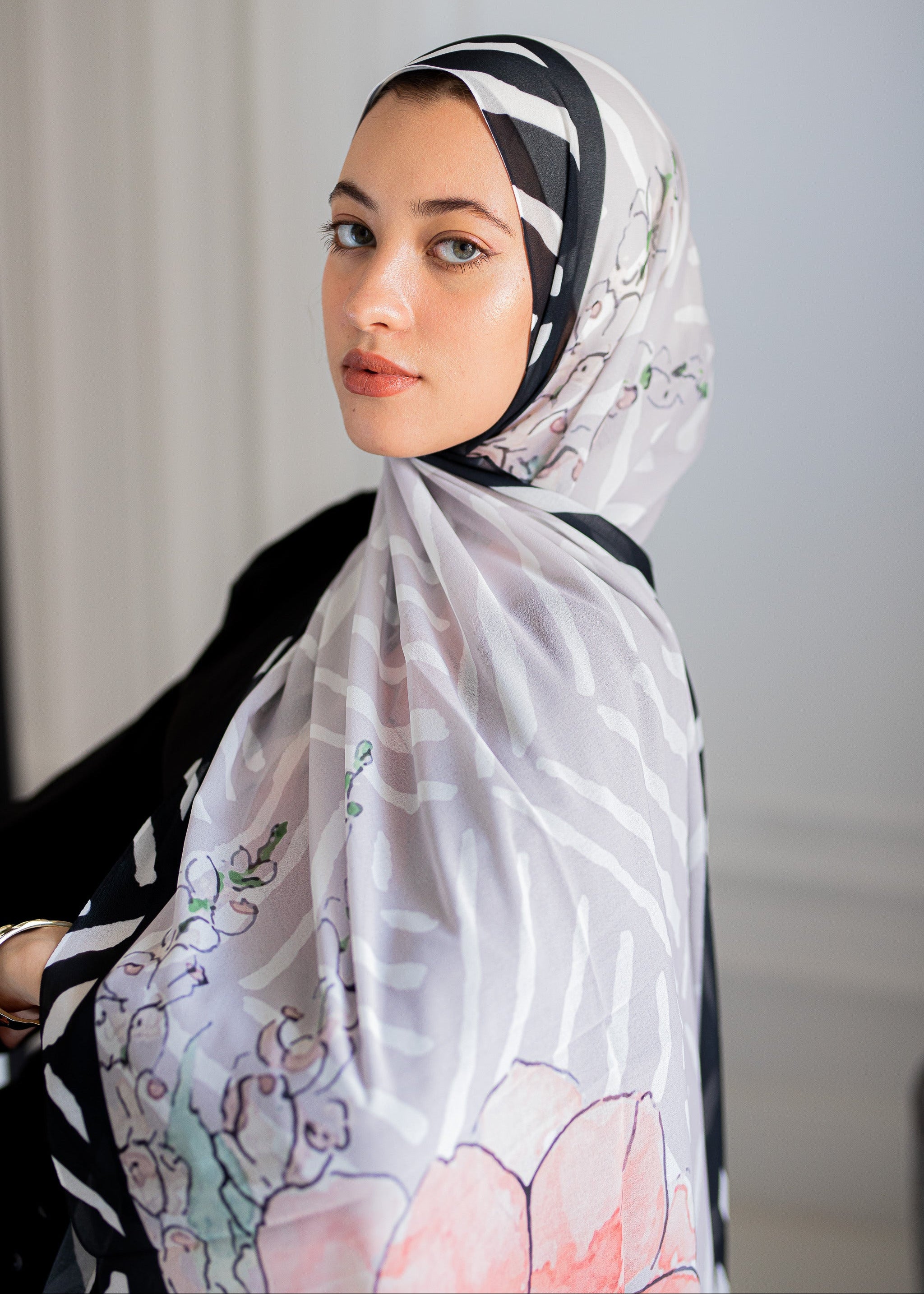 Close-up of Roselle Canvas Hijab – Watercolor Floral and Monochrome Pattern