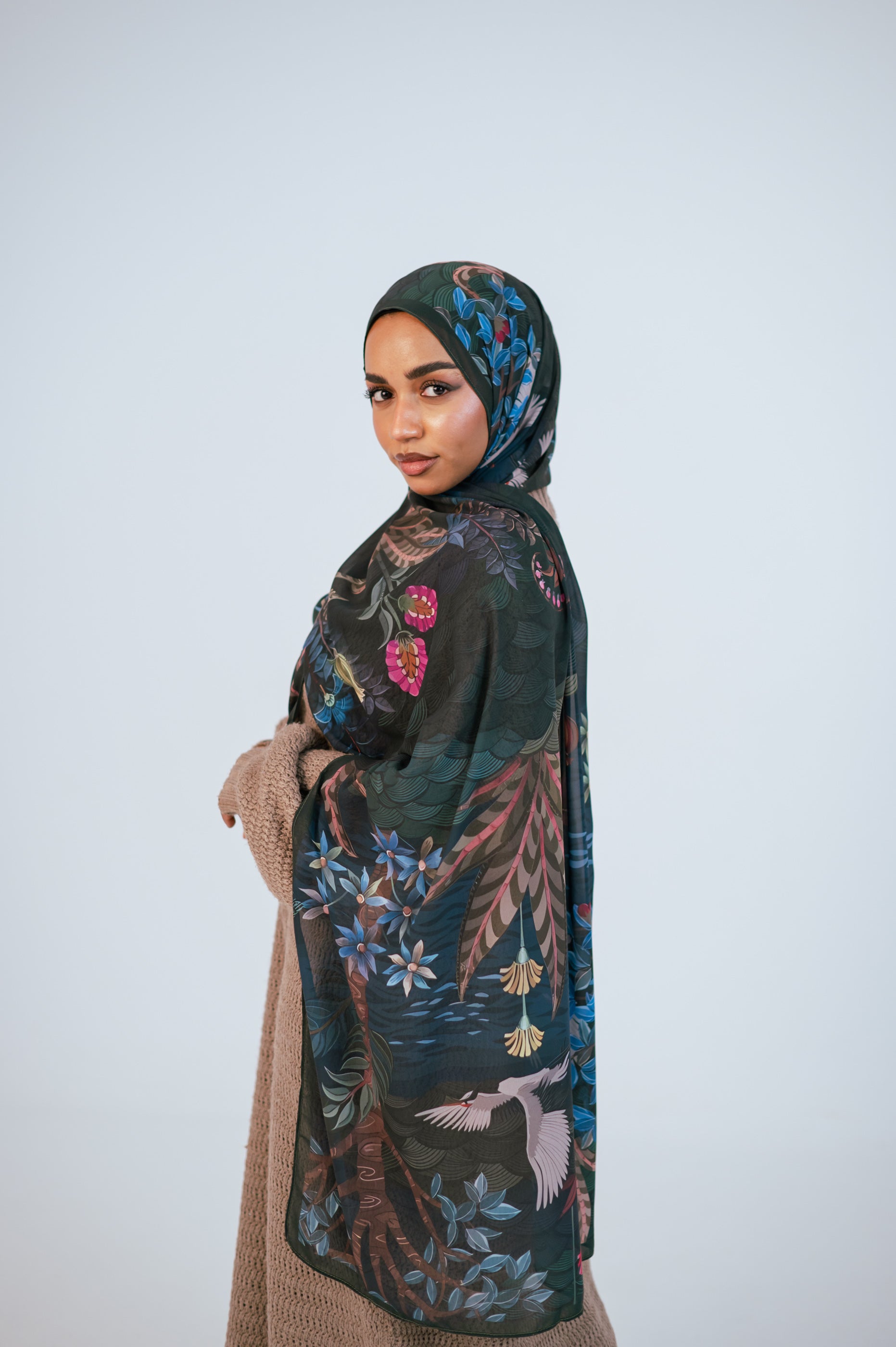 Side and back detail of Secret Garden Luxury Chiffon Hijab showing botanical artwork and flowing drape.