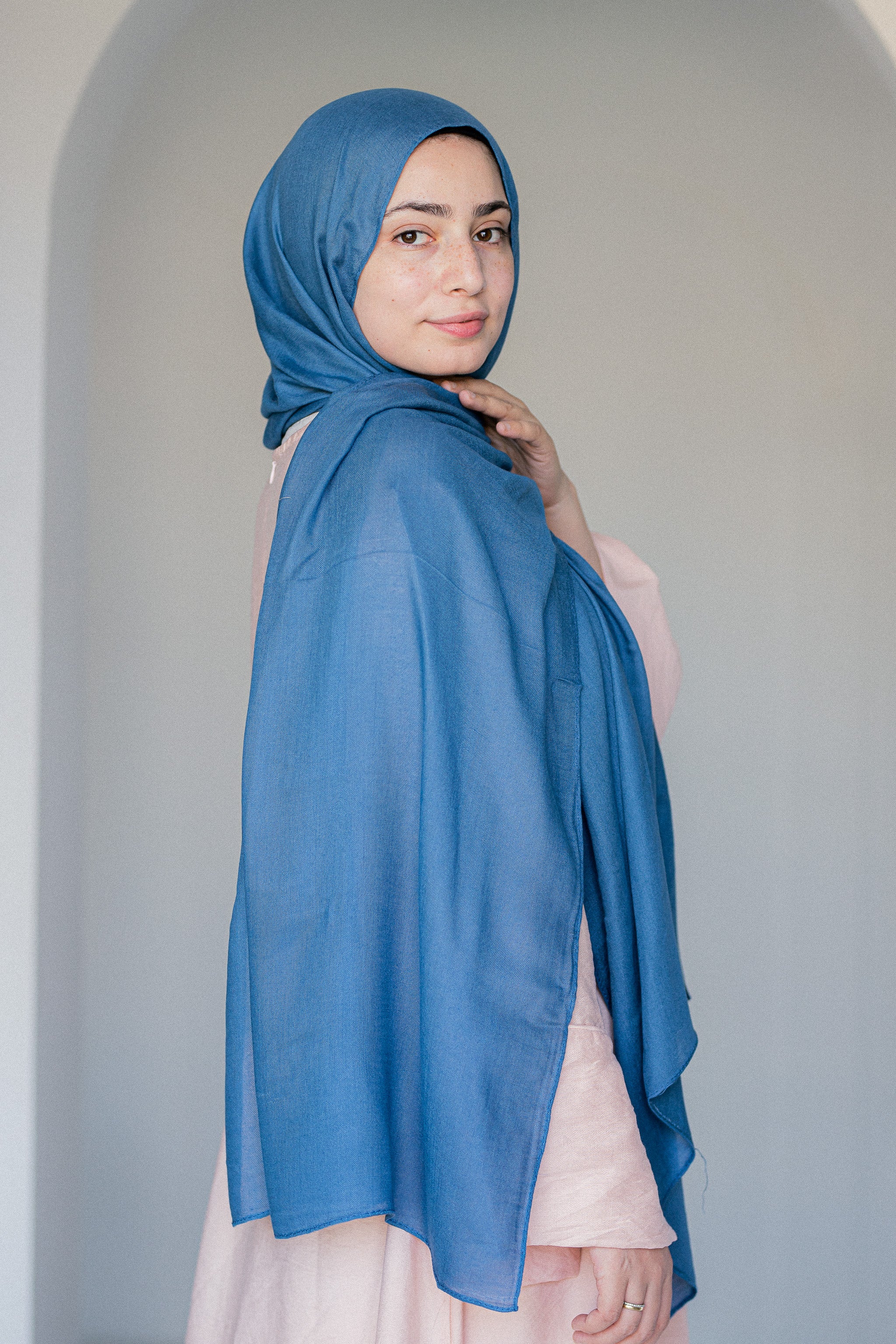 Side profile view of Tidemist Modal Cotton Hijab in light blue drape