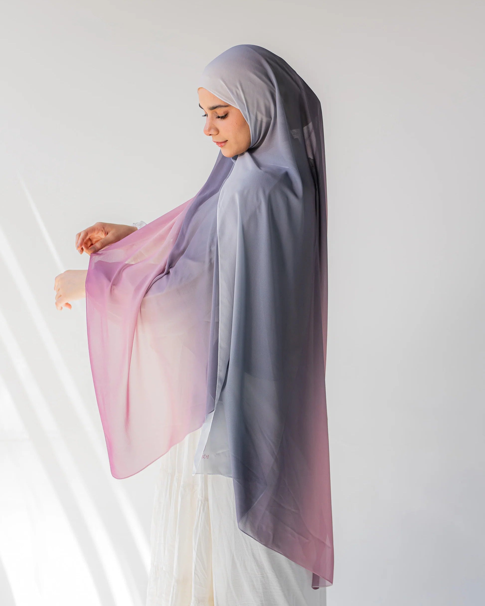 Side profile of model wearing Viola chiffon hijab, showcasing the flow and drape of the fabric