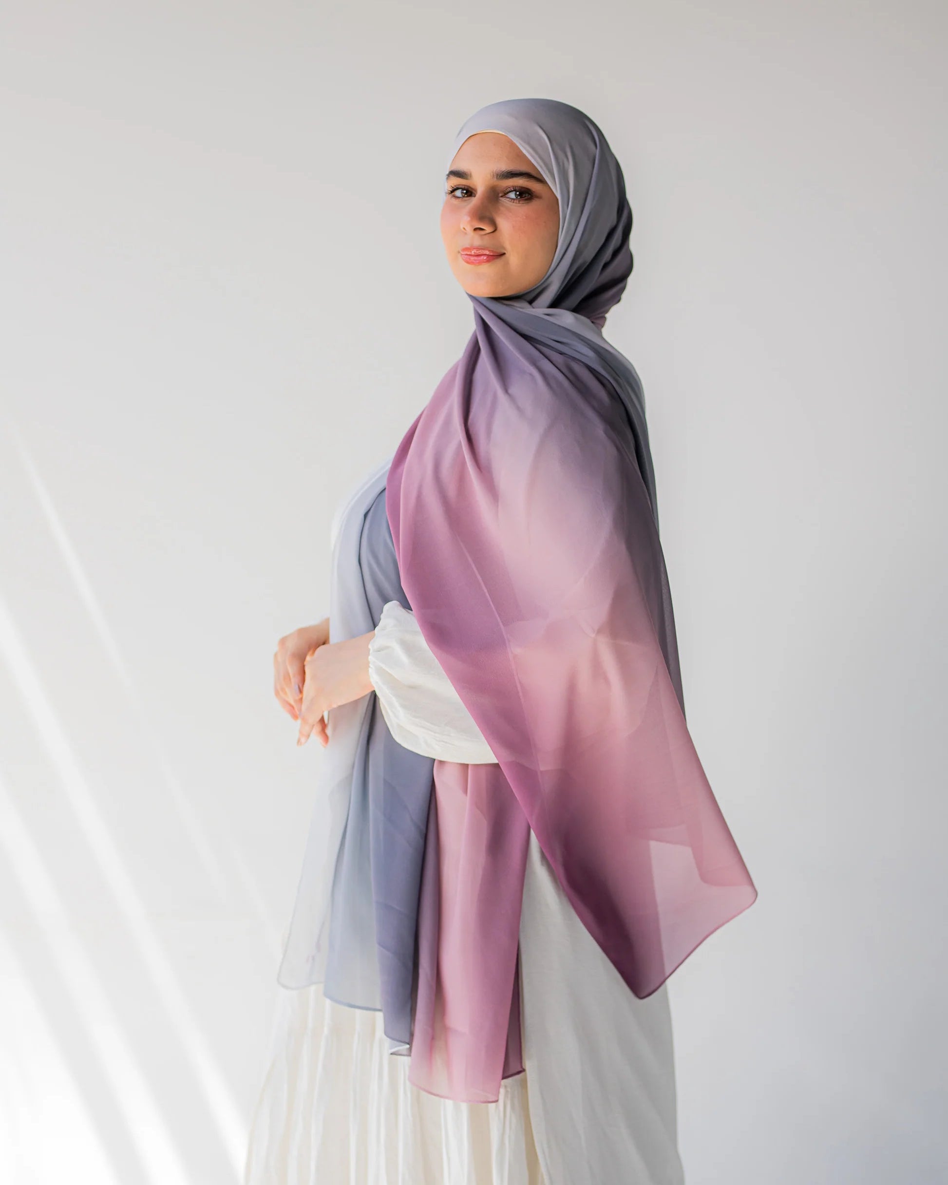 Side profile of model wearing Viola chiffon hijab, showcasing the flow and drape of the fabric