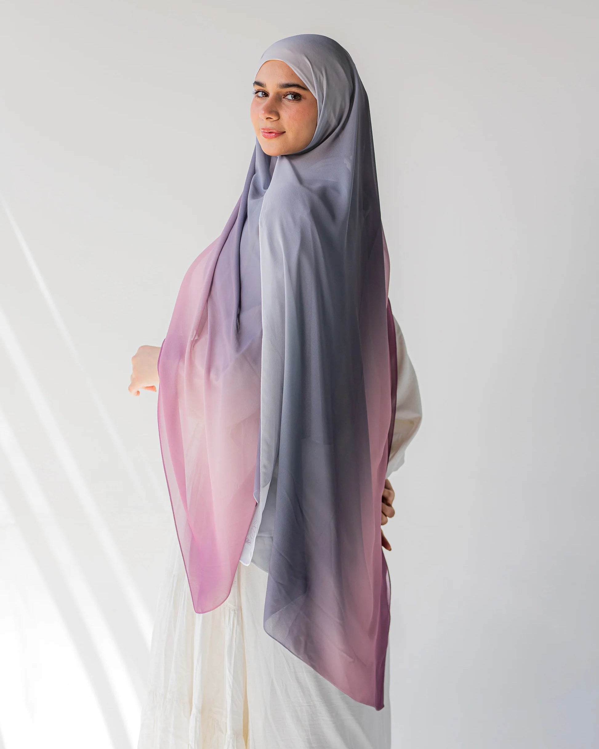 Side profile of model wearing Viola chiffon hijab, showcasing the flow and drape of the fabric
