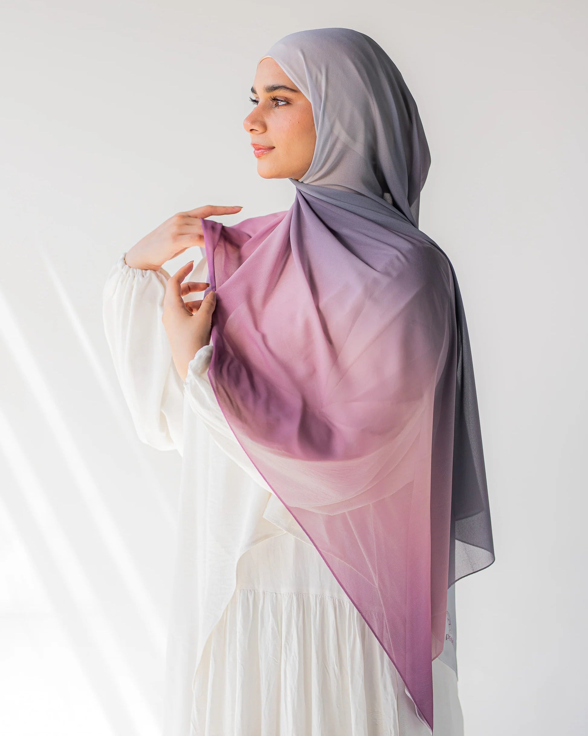 Side profile of model wearing Viola chiffon hijab, showcasing the flow and drape of the fabric