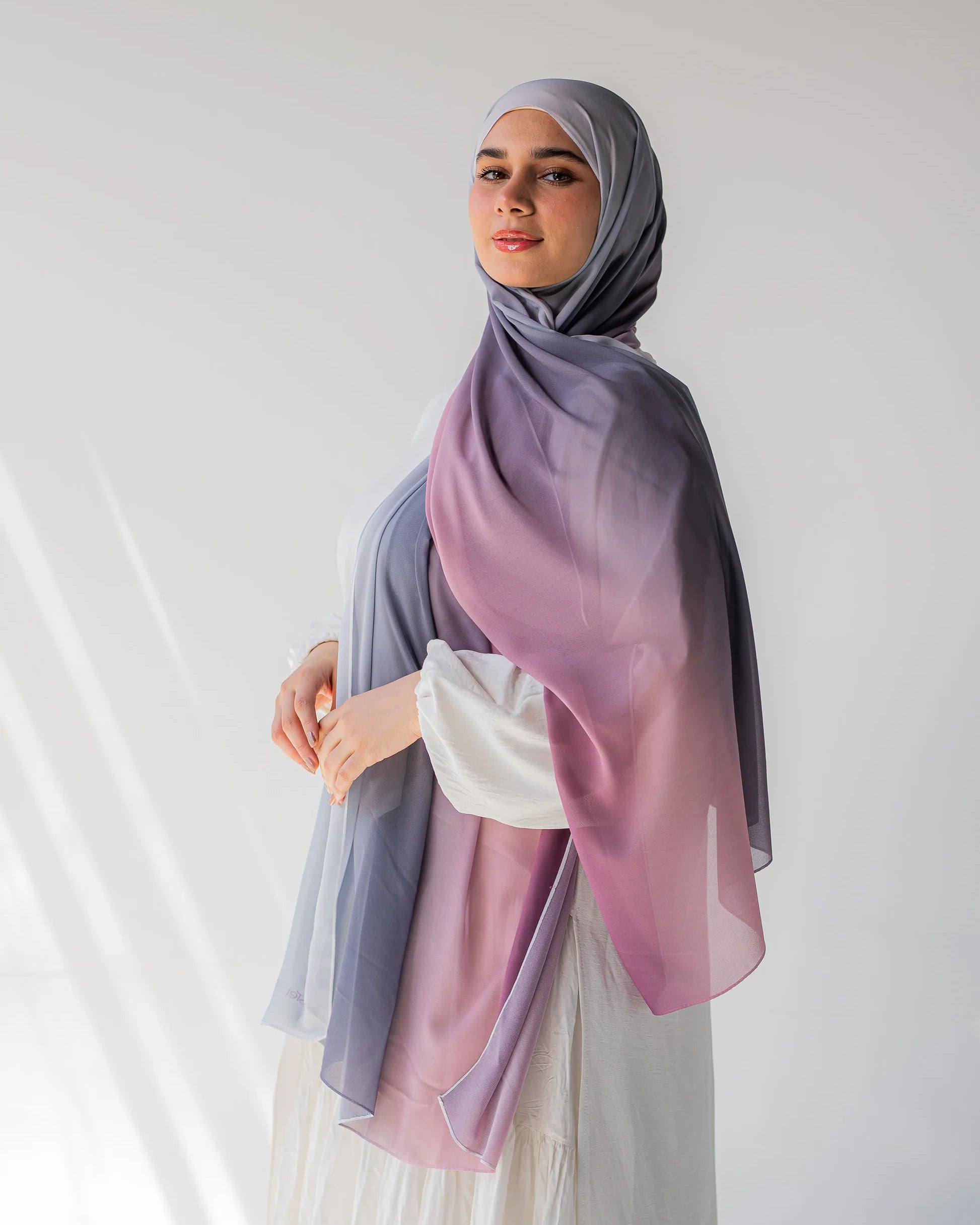 Side profile of model wearing Viola chiffon hijab, showcasing the flow and drape of the fabric