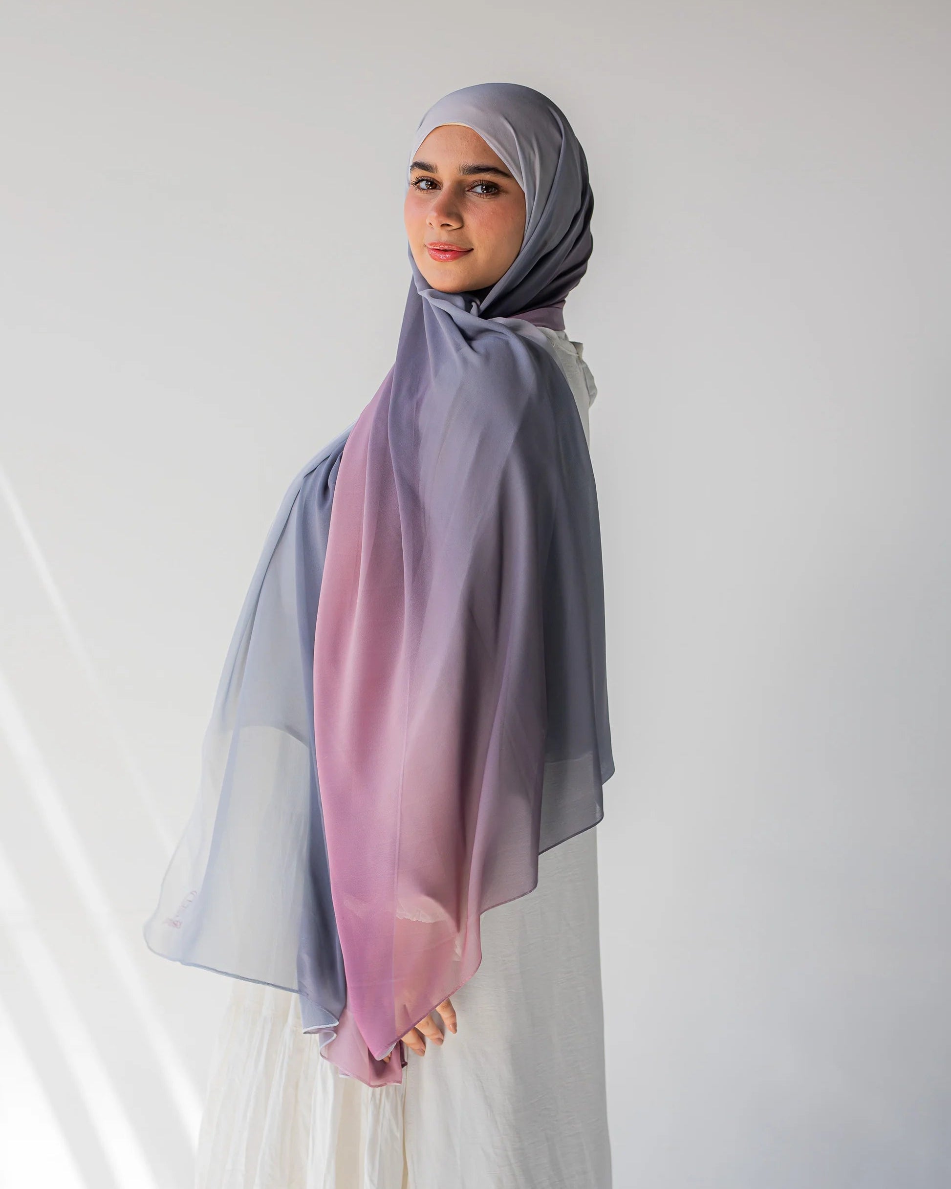 Side profile of model wearing Viola chiffon hijab, showcasing the flow and drape of the fabric